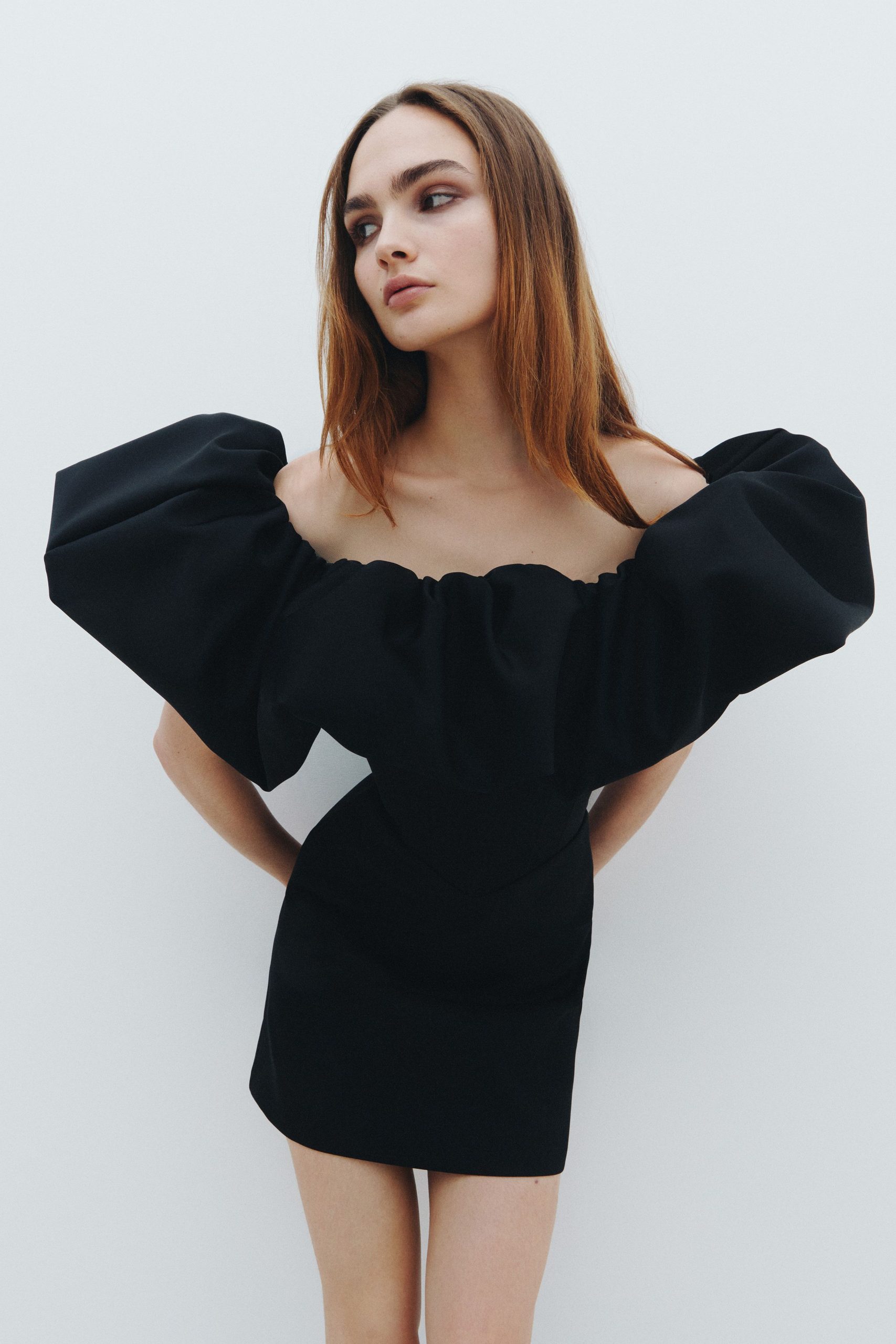black off-shoulder mini-dress