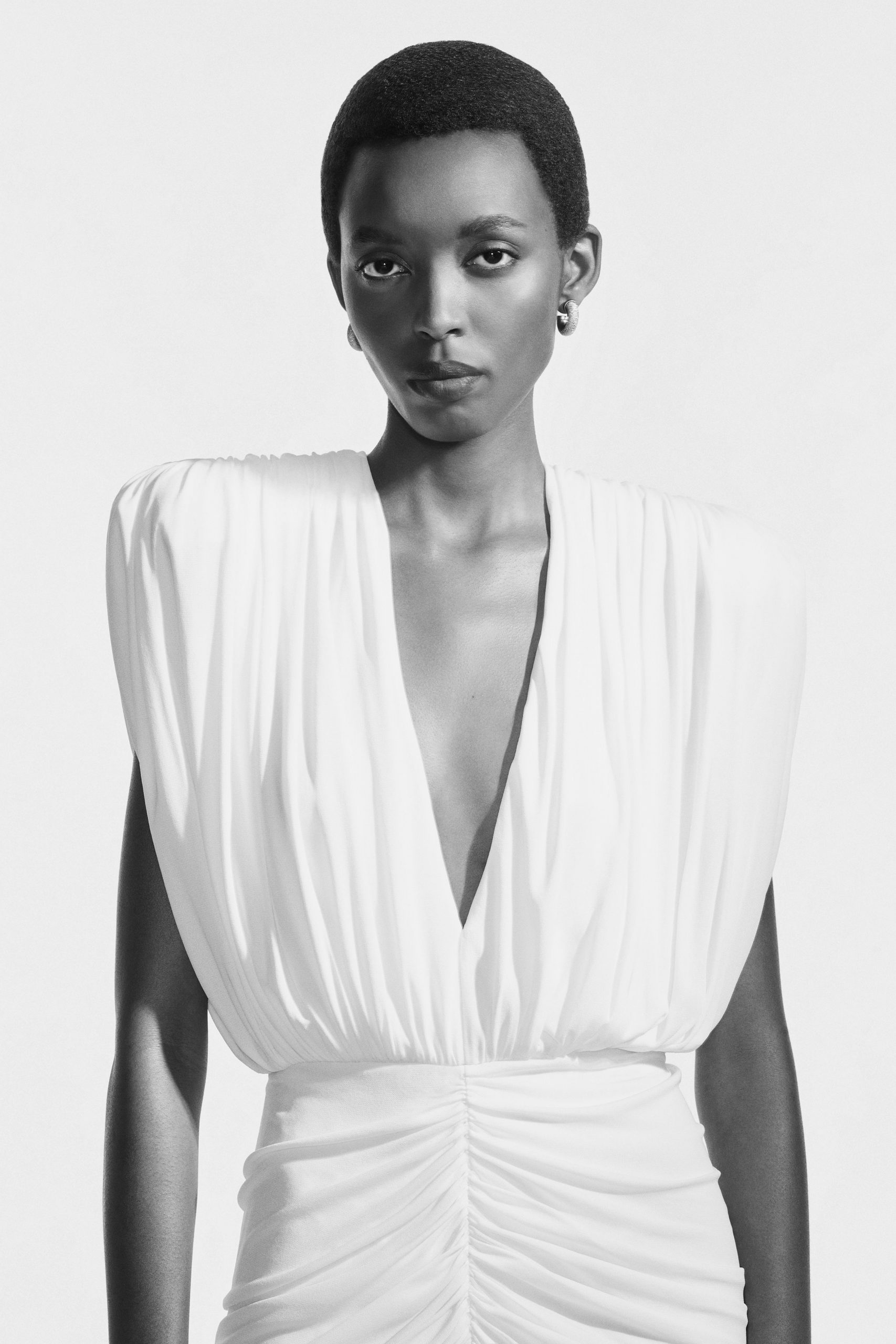 white silk sleeveless gown