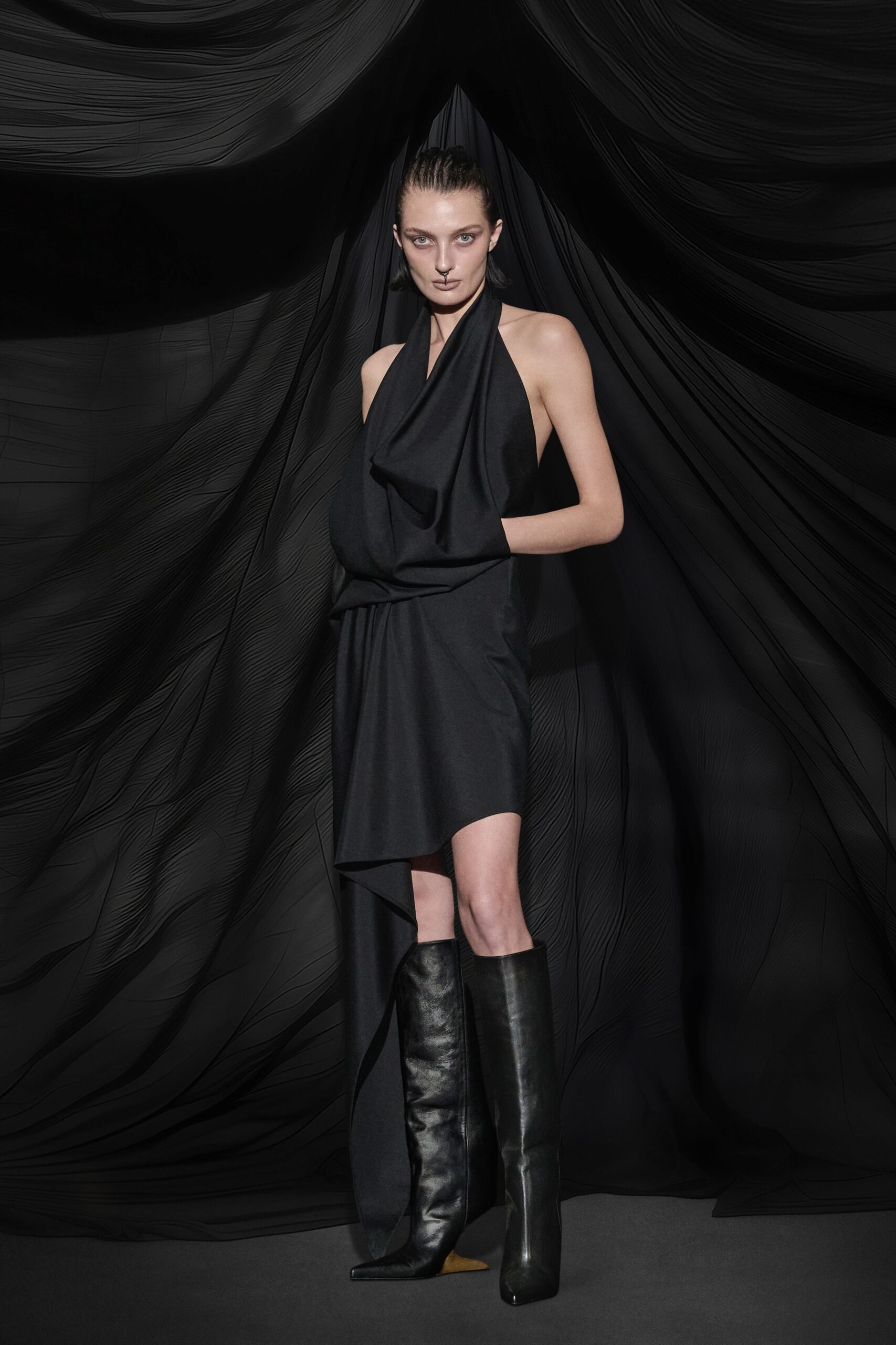 black draped halter dress with boots
