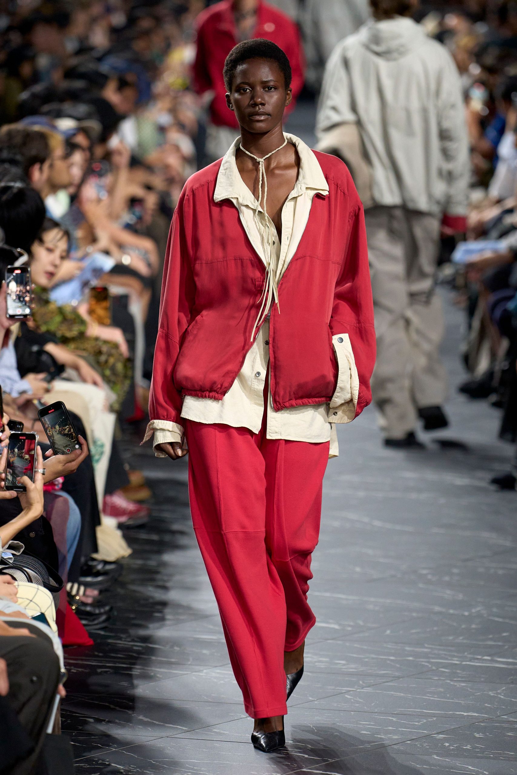 red oversized jacket with beige shirt