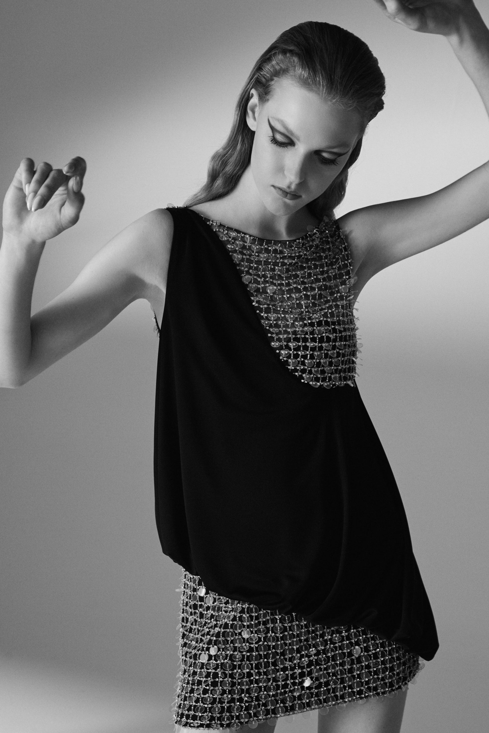 black beaded sleeveless mini dress