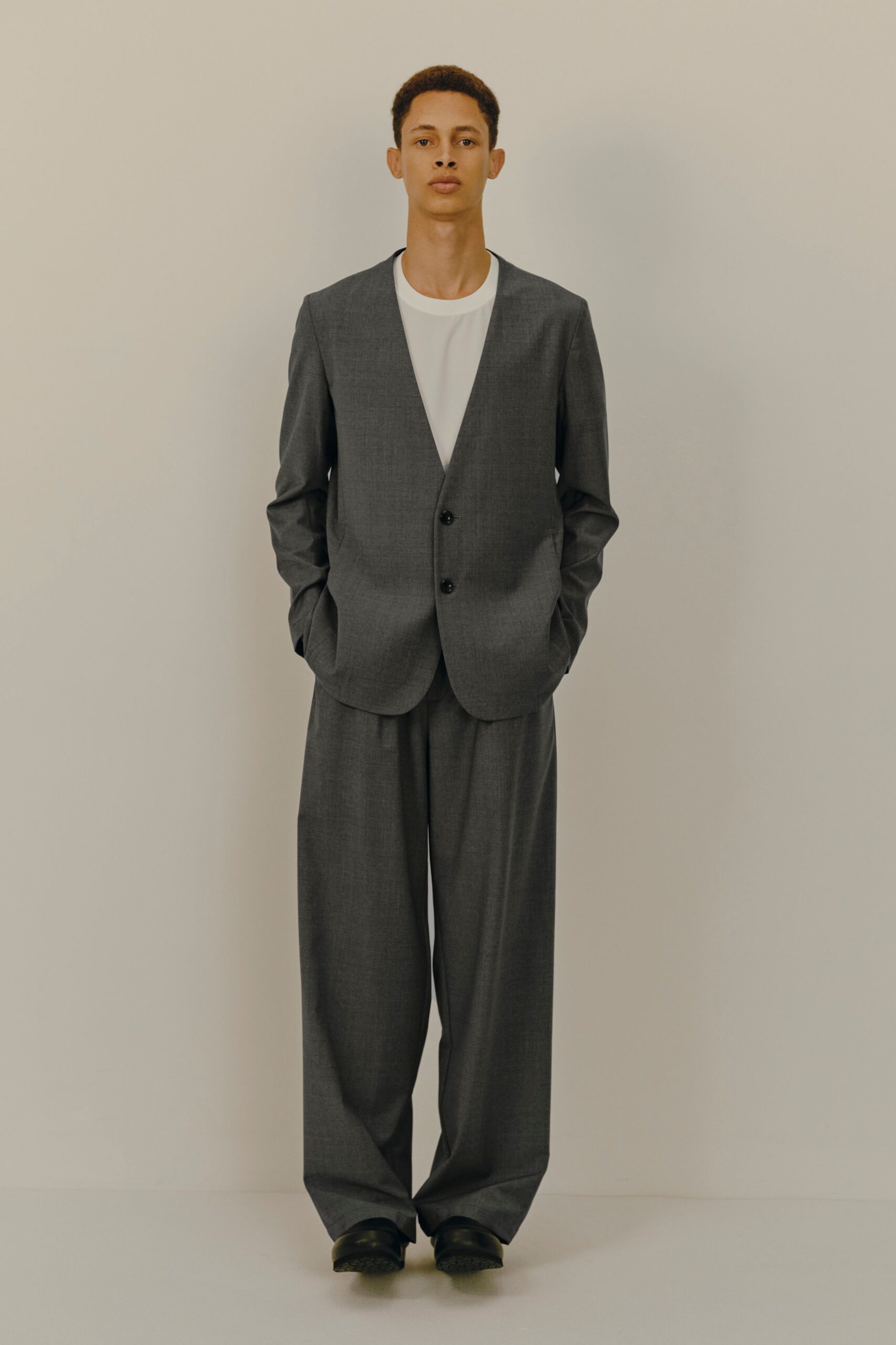 gray tailored blazer with white t-shirt