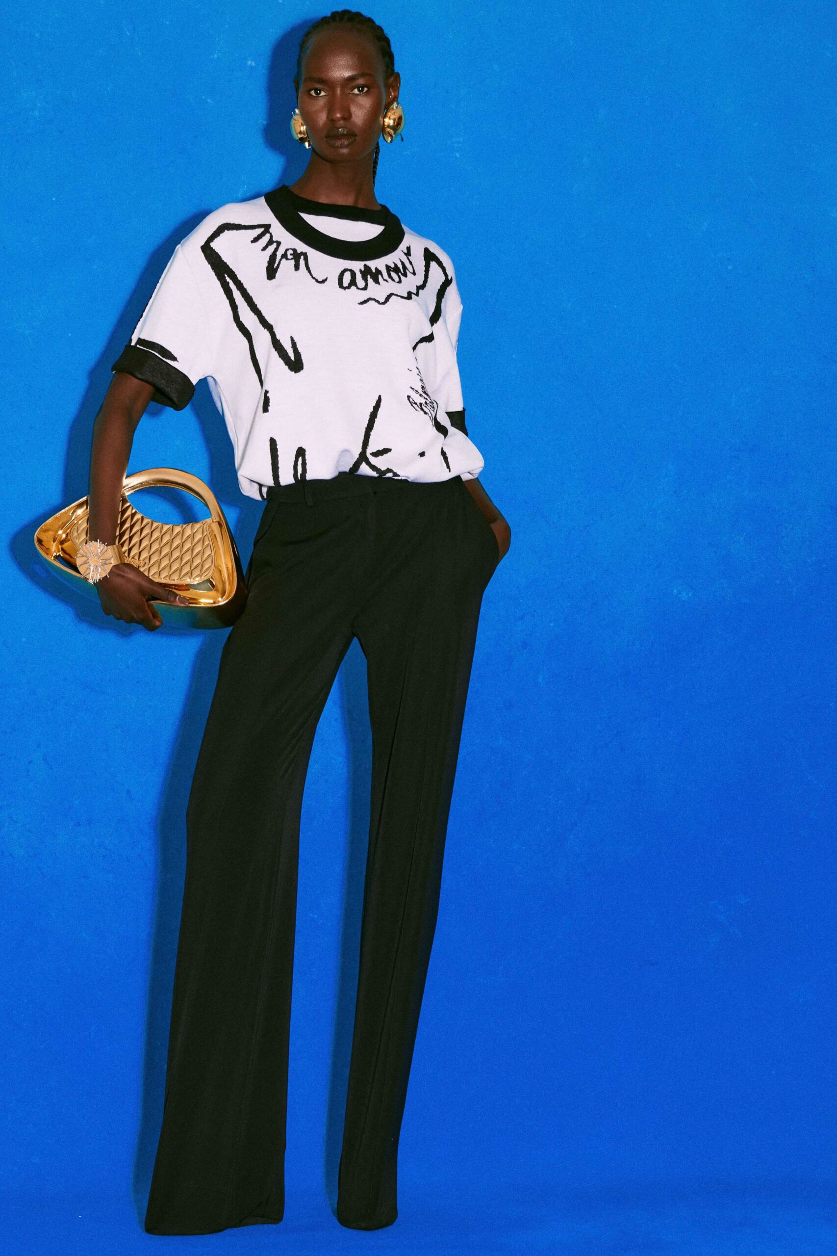 white printed t-shirt with black pants
