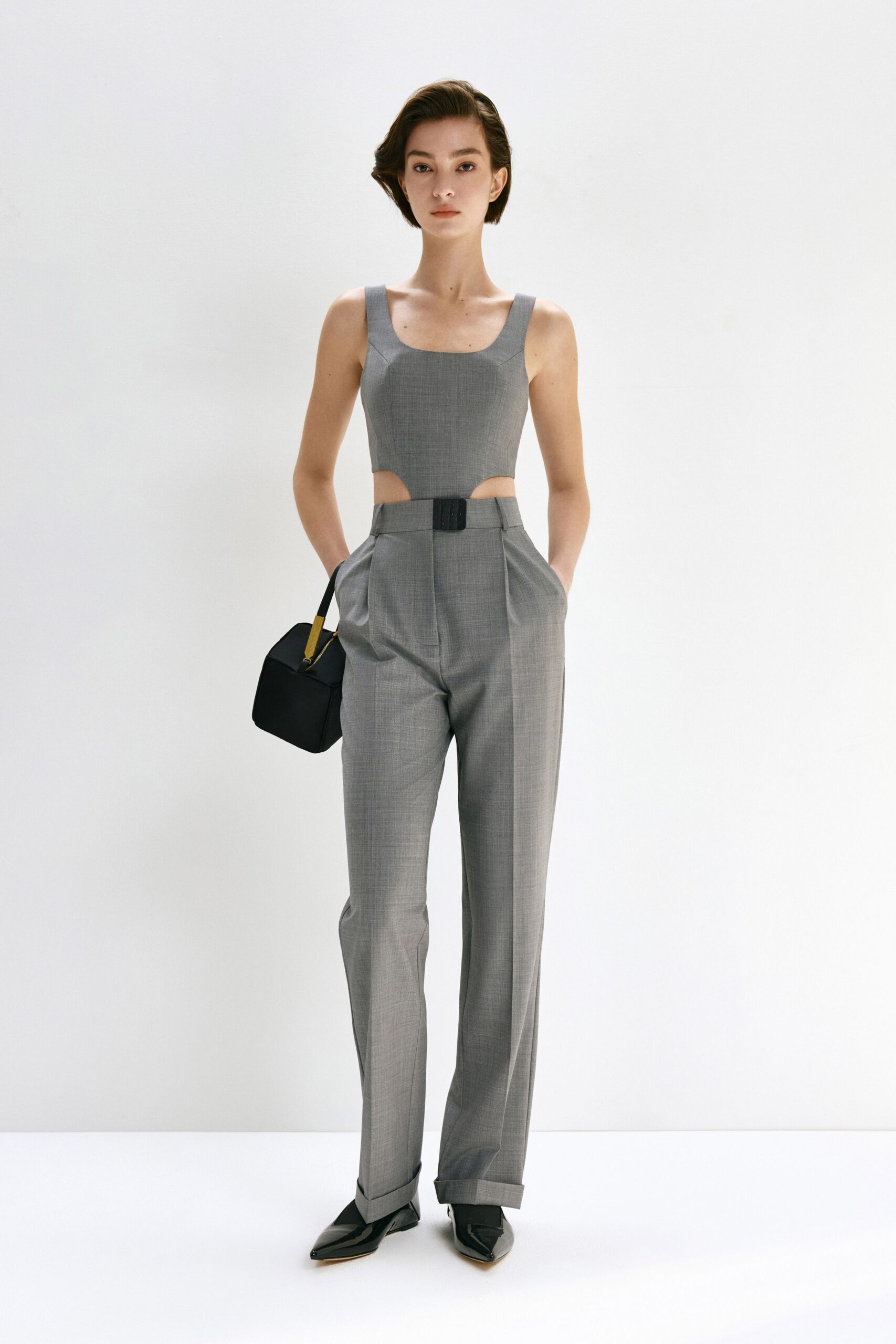 gray tailored pants and fitted top