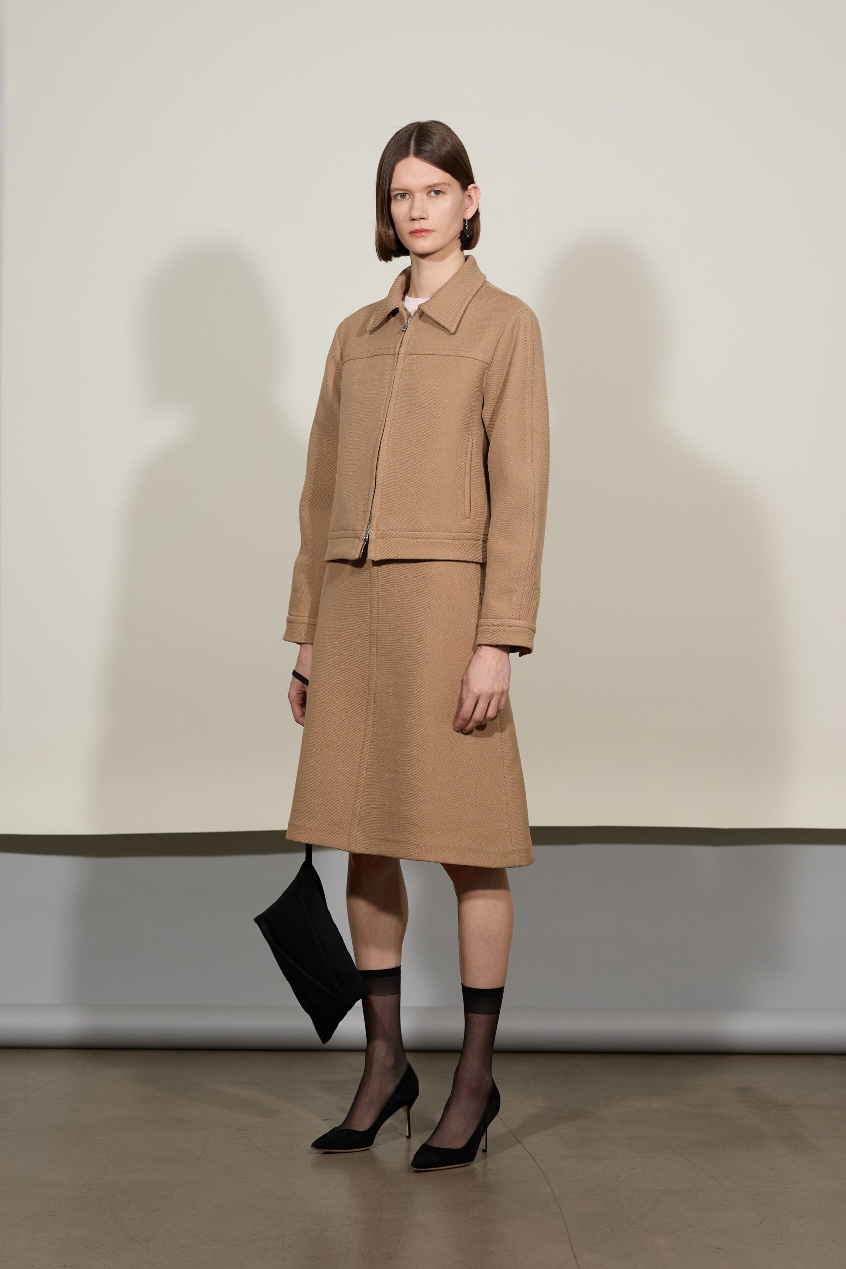 beige jacket and skirt outfit