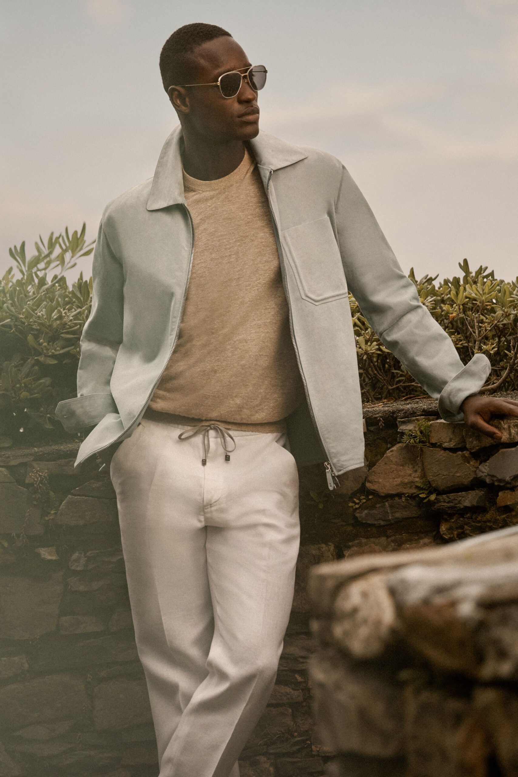 light blue suede jacket with beige top