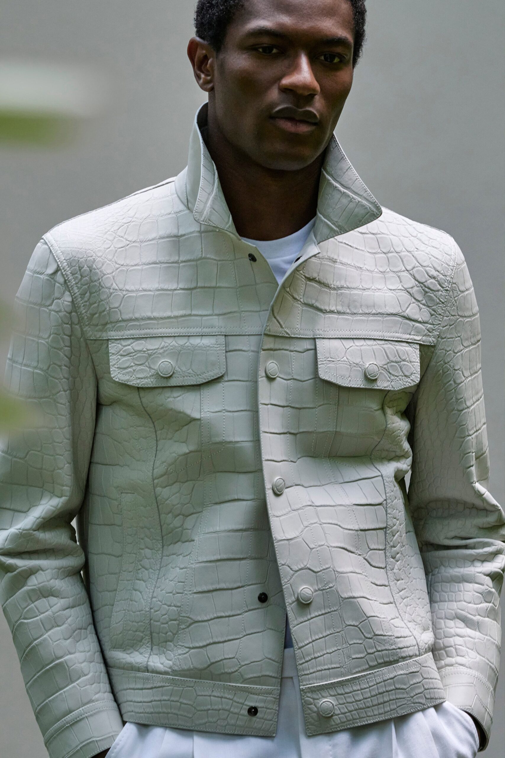 gray leather long-sleeve collared fitted textured jacket