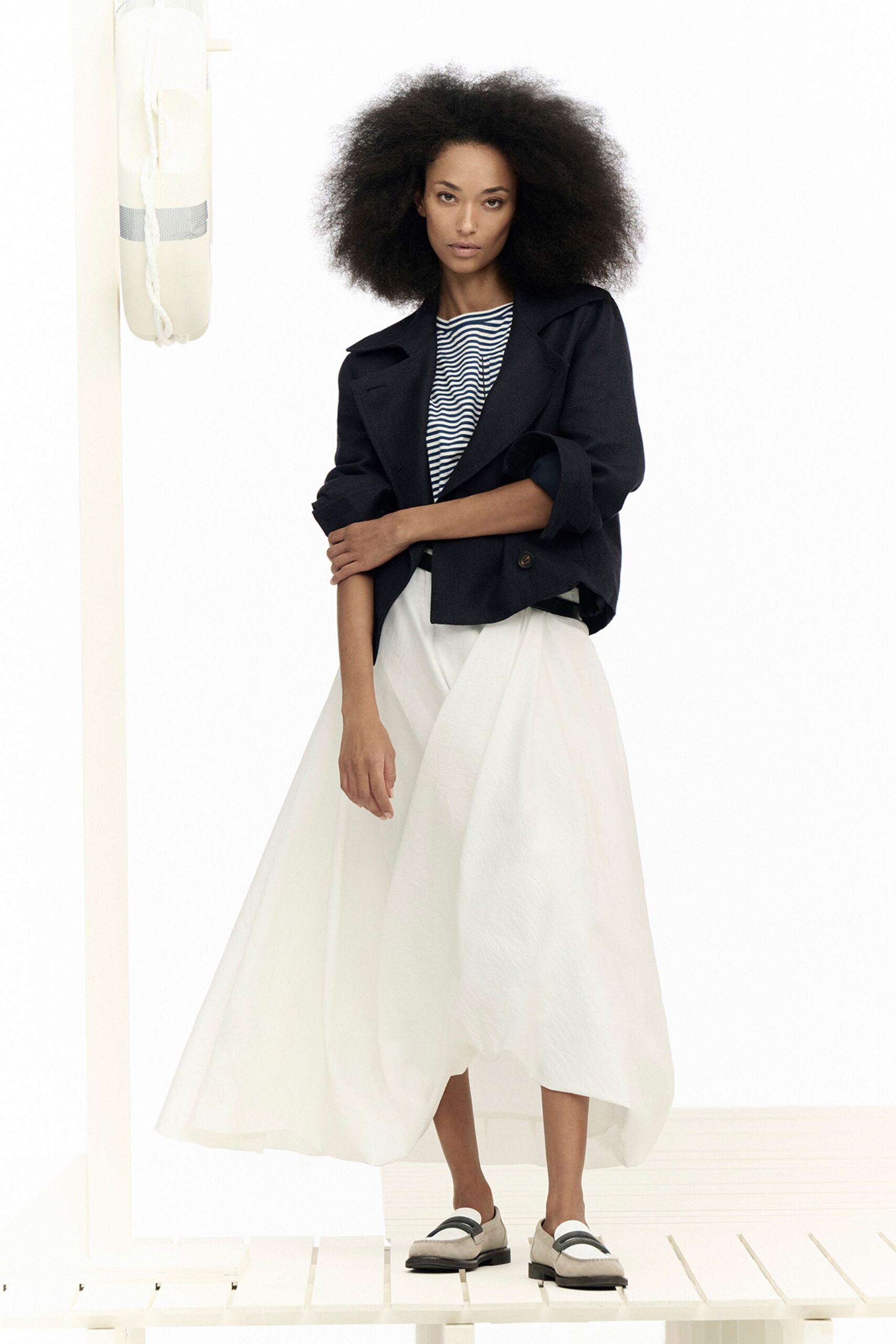 black jacket white maxi skirt