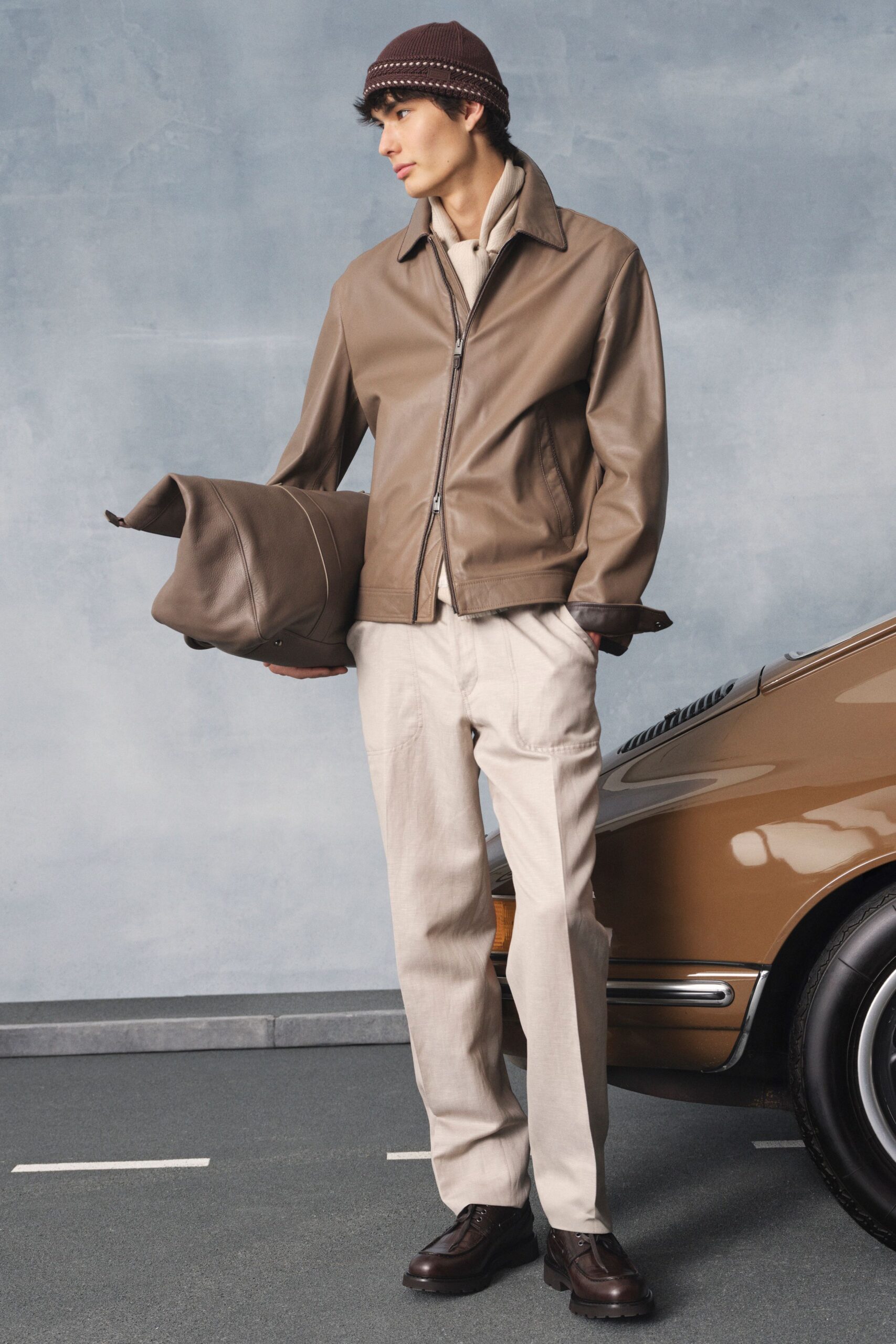 brown leather long-sleeve collared structured zippered pockets jacket