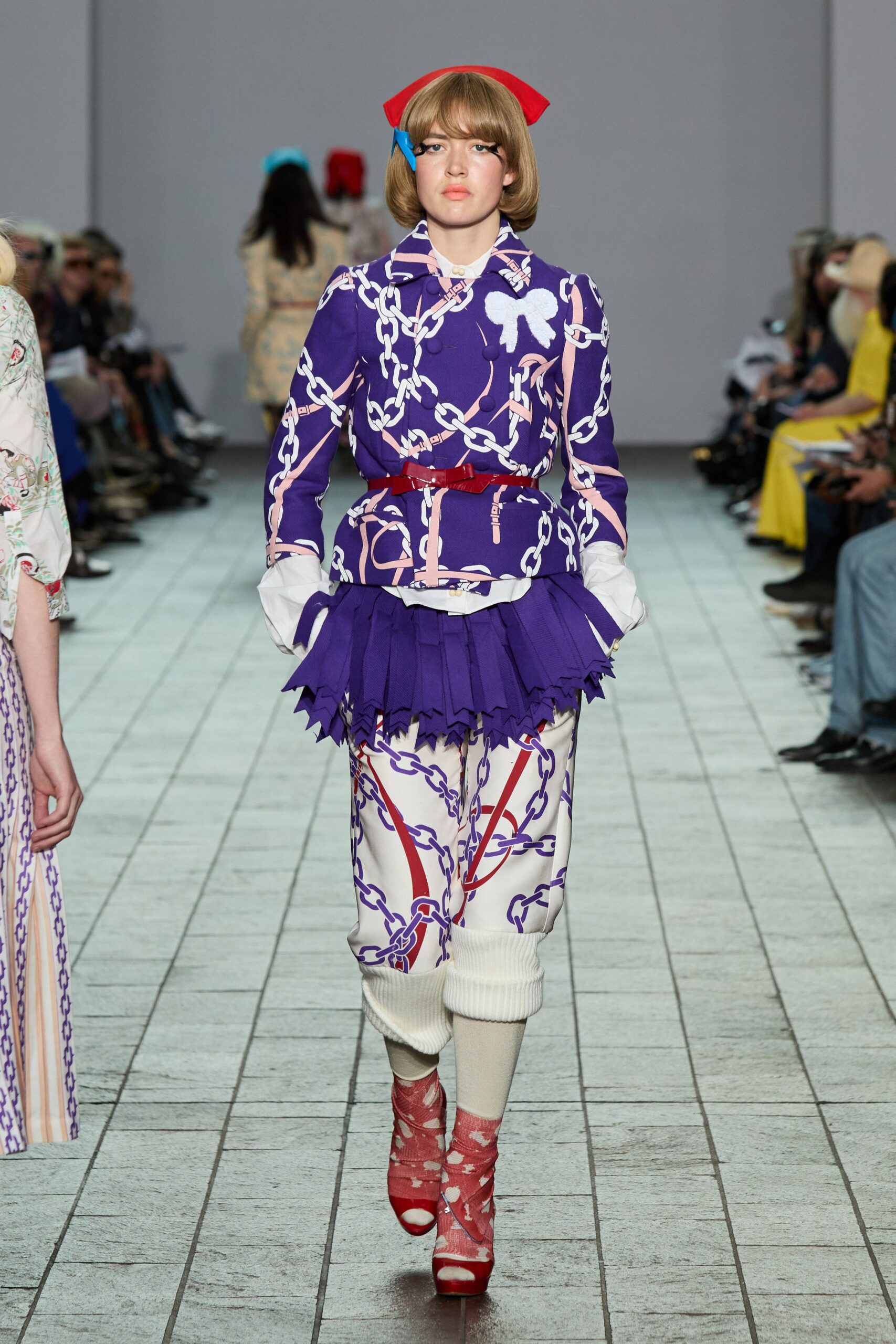 purple printed jacket with mini skirt