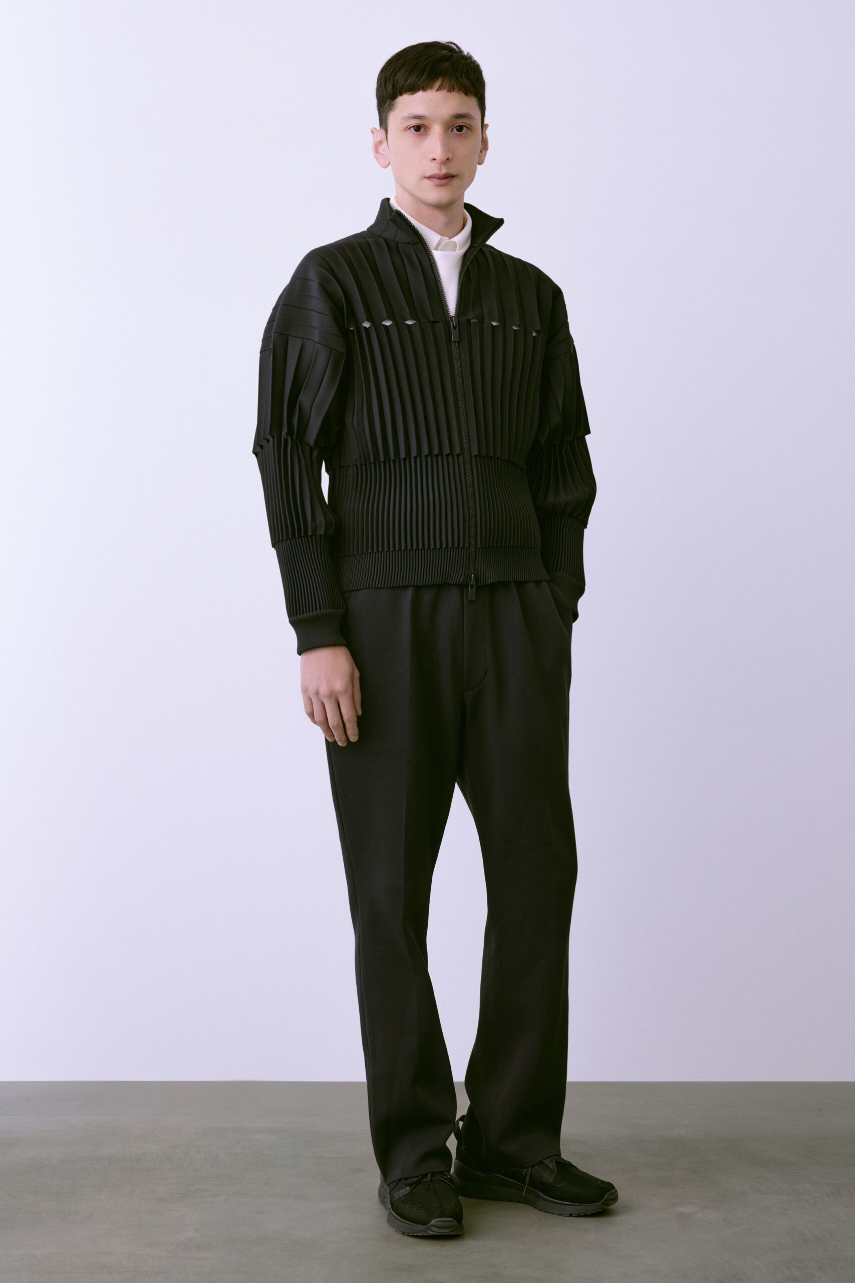 black pleated jacket and pants