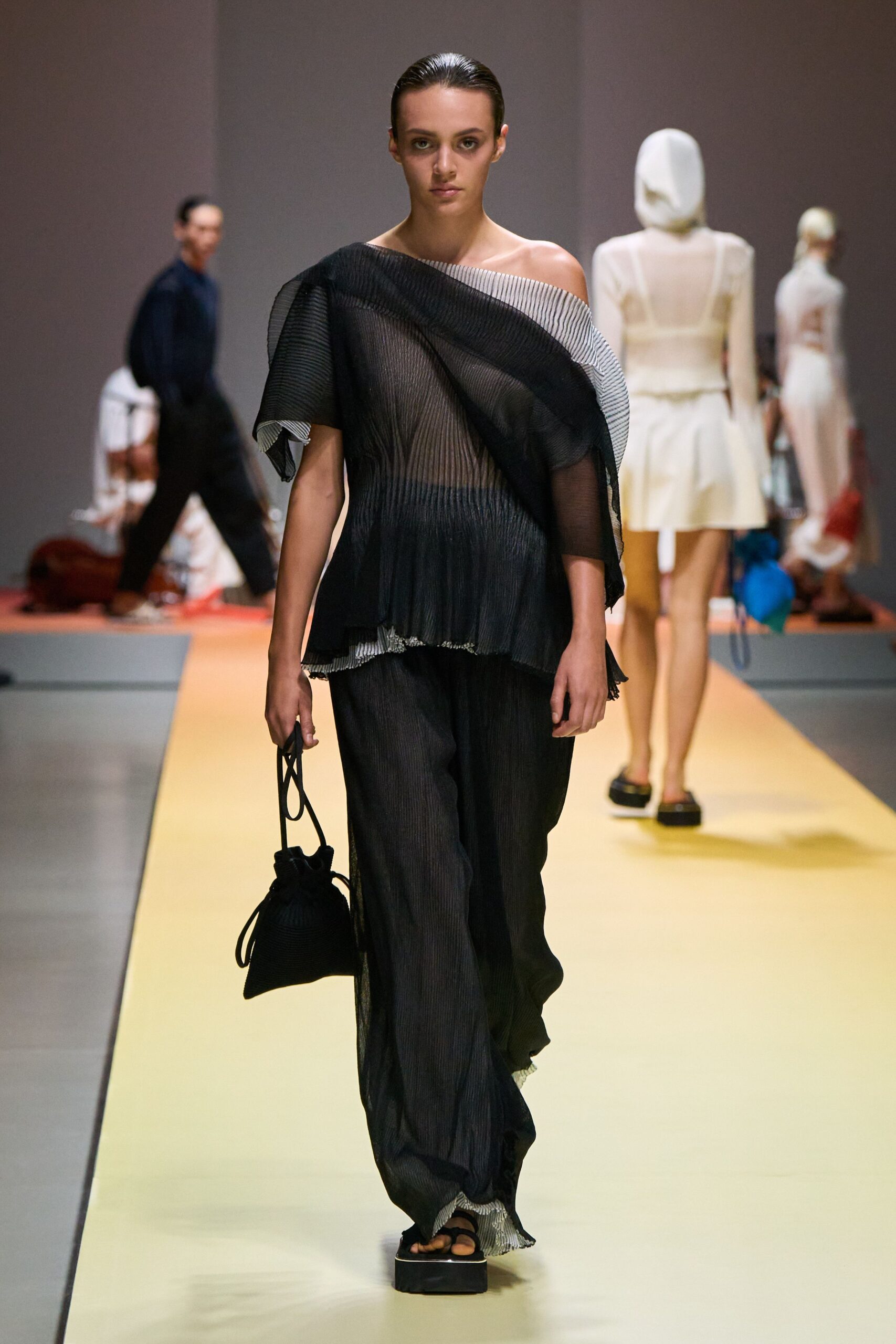 black cotton sleeveless off-shoulder relaxed pleated sheer top