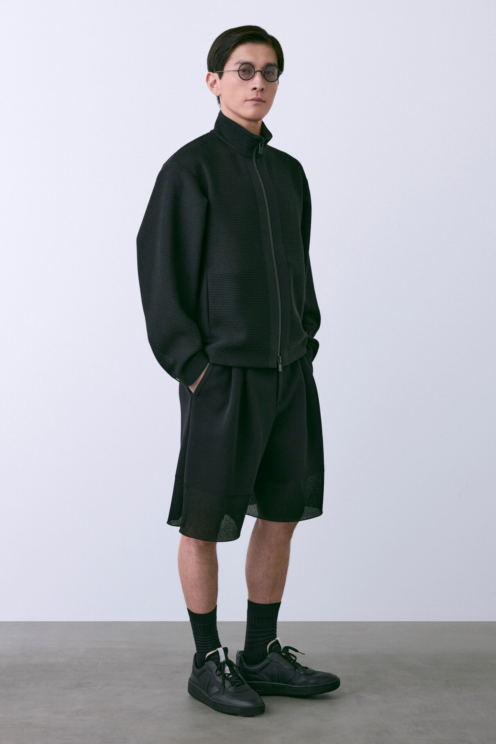 black knit long-sleeve high-neck oversized zippered textured jacket