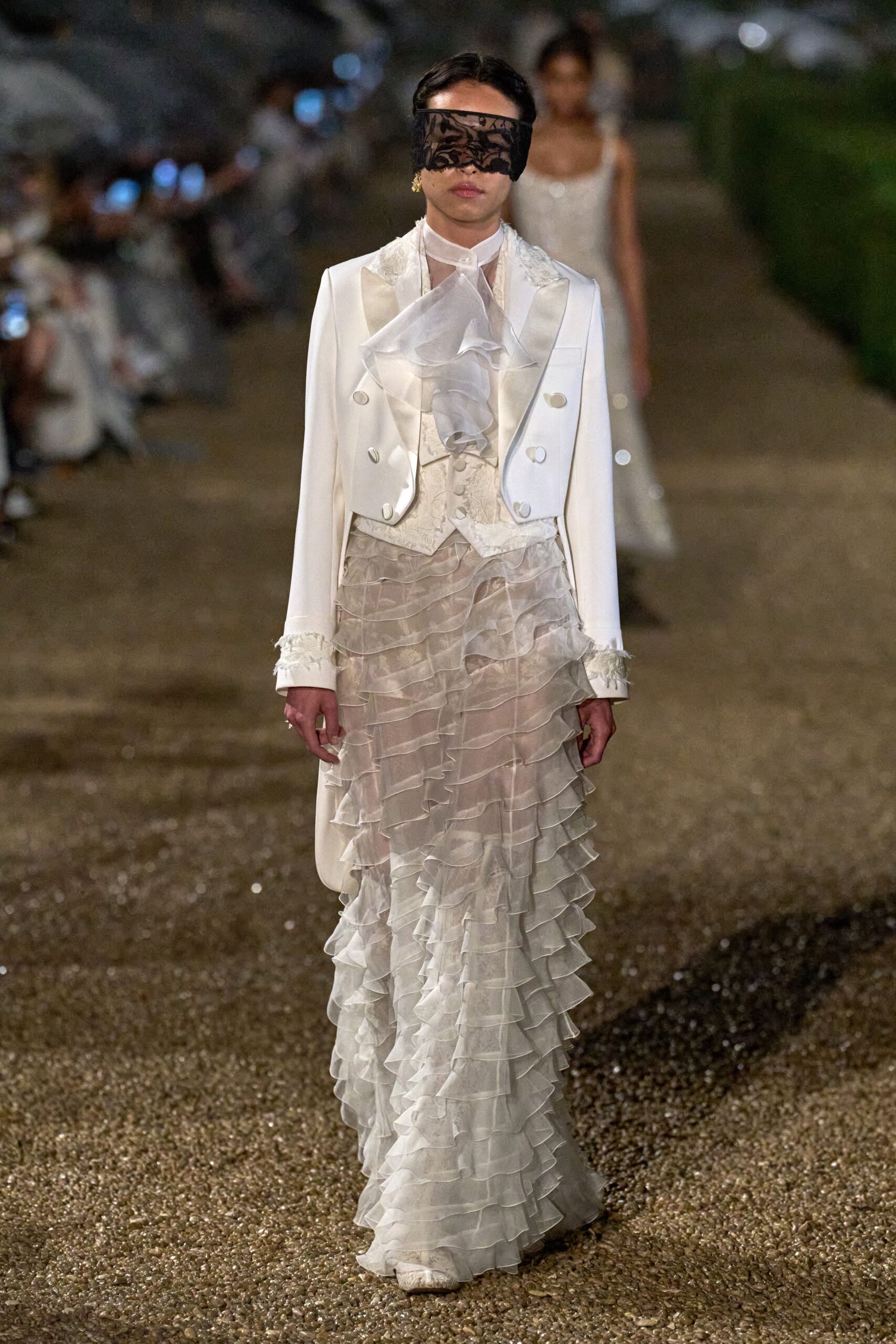 white silk long-sleeve collared fitted ruffled layered gown