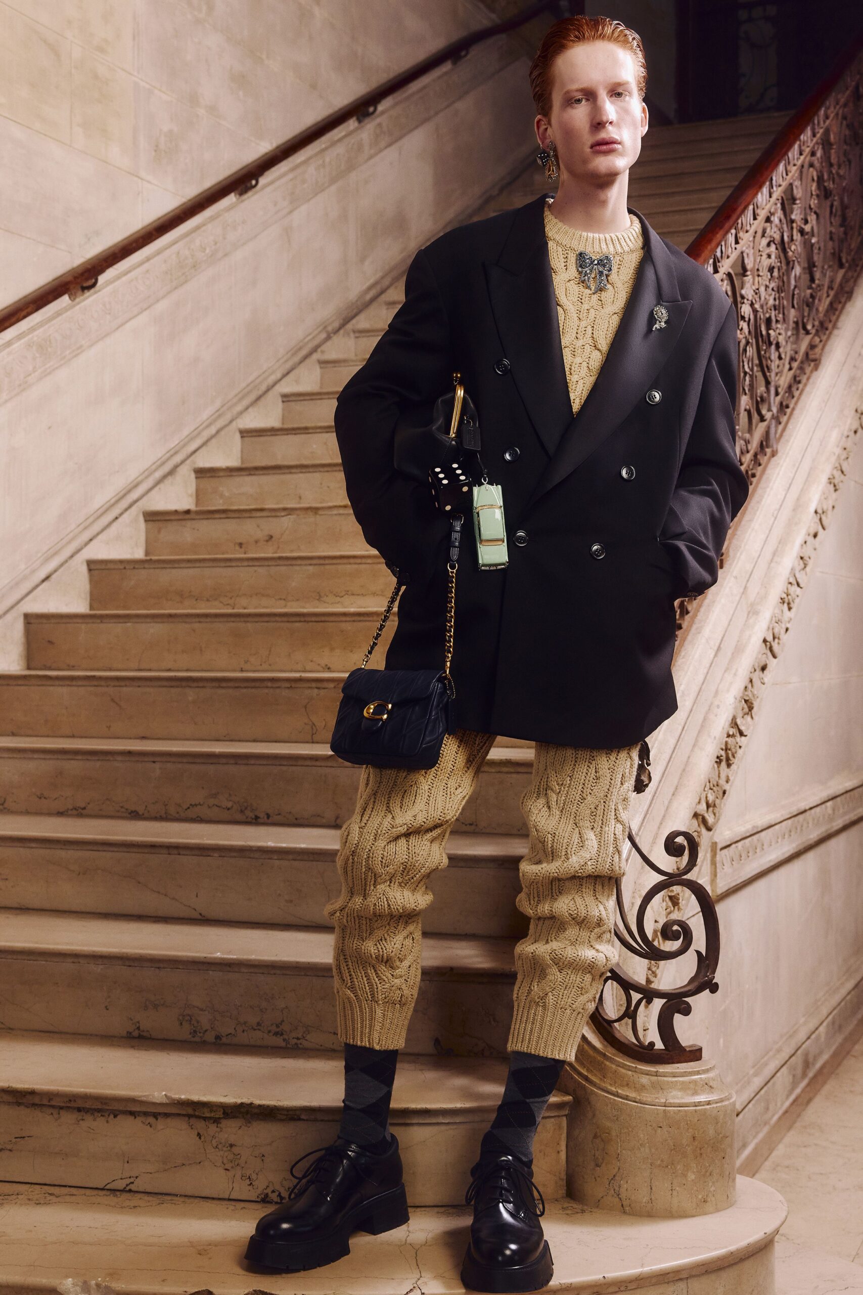 black oversized blazer beige sweater pants