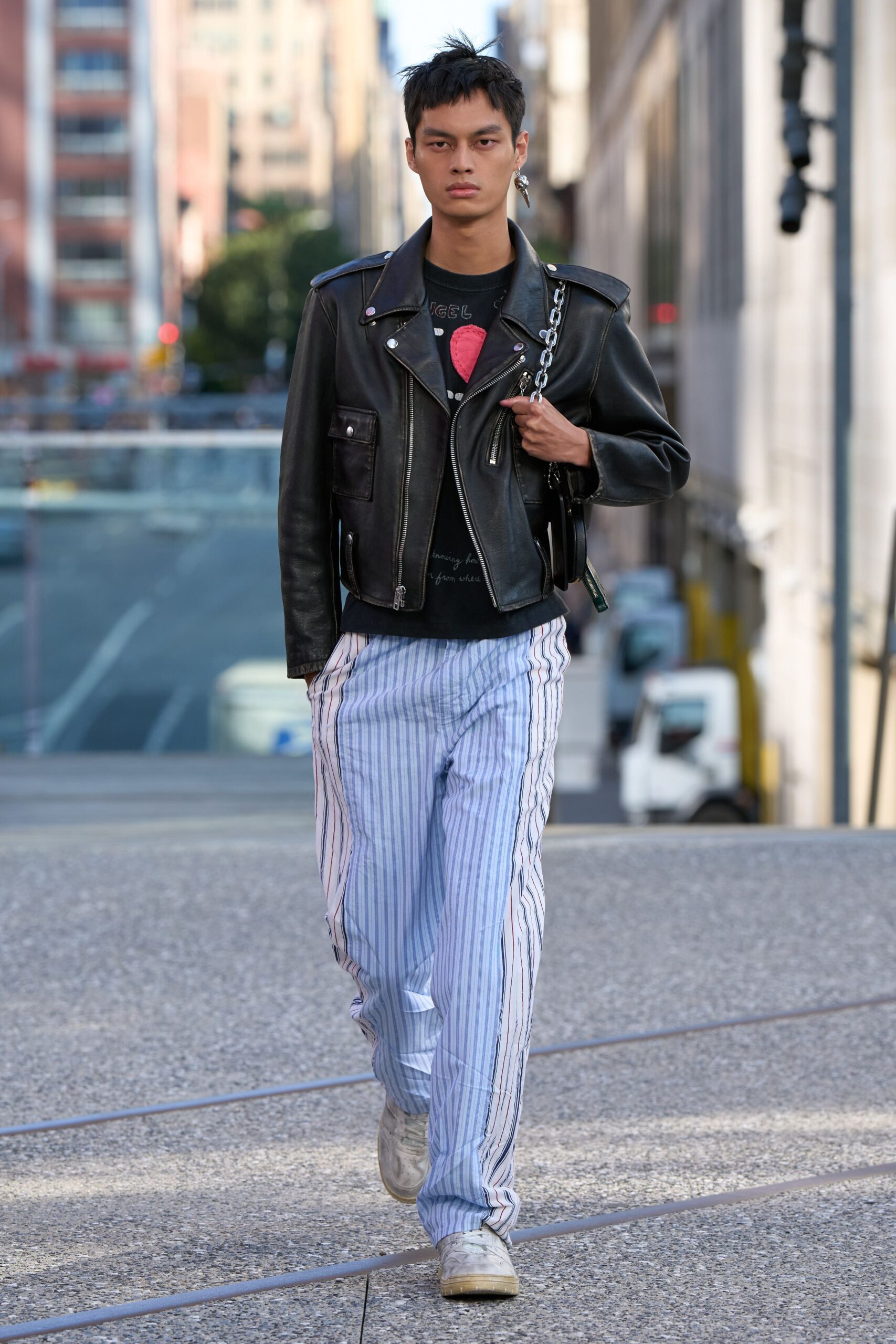 black leather jacket with striped pants