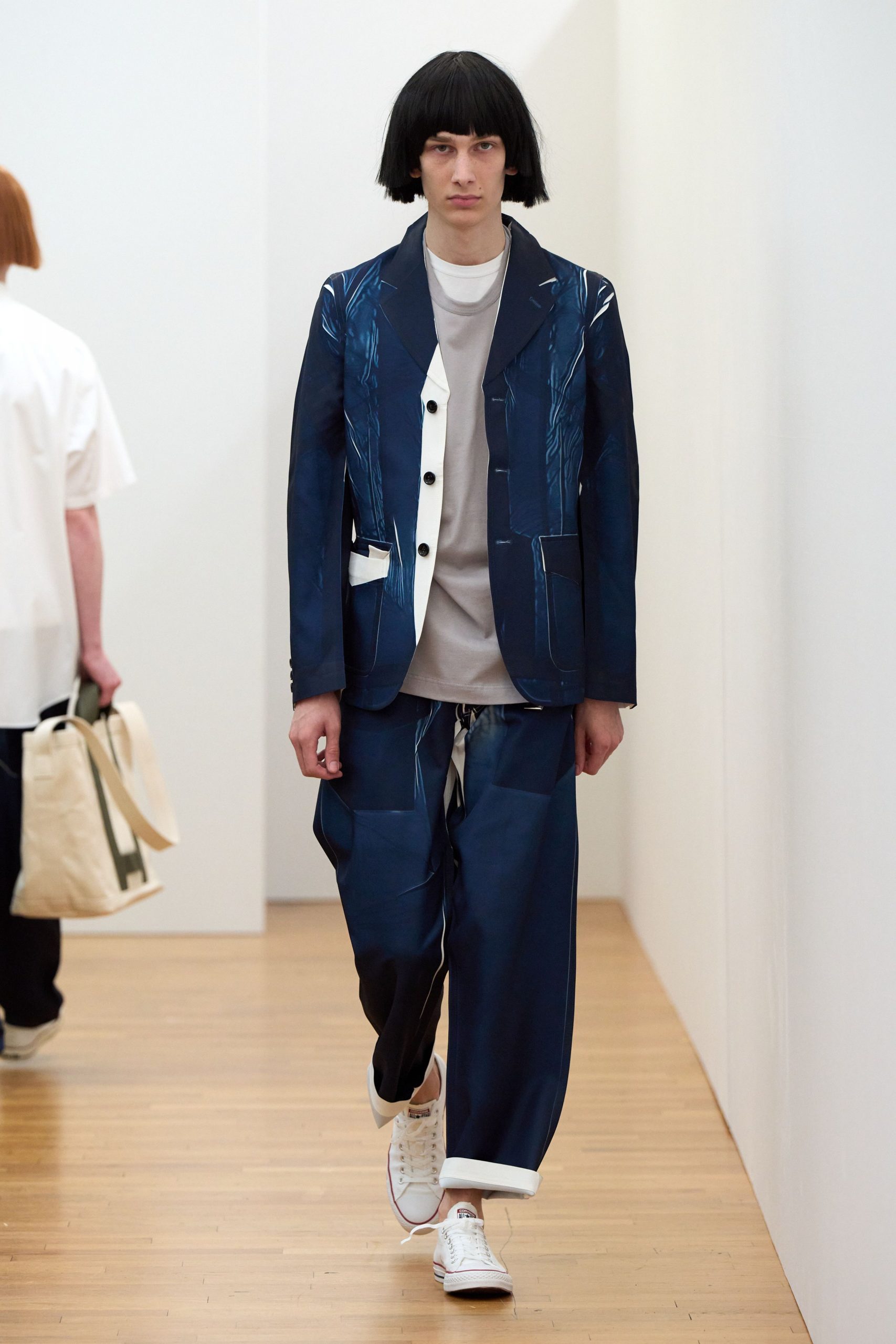 blue relaxed suit with gray t-shirt