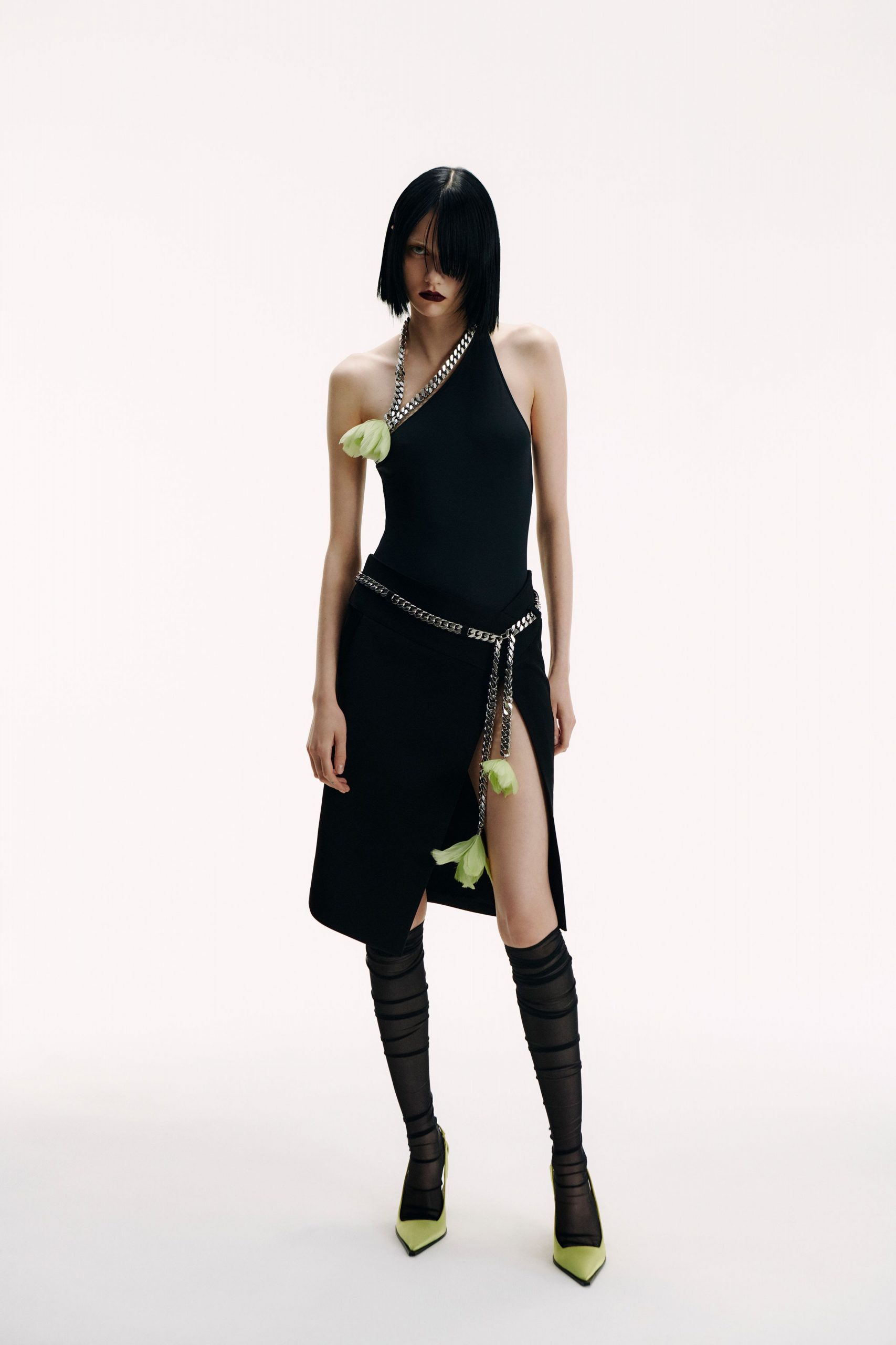 black bodysuit and skirt ensemble