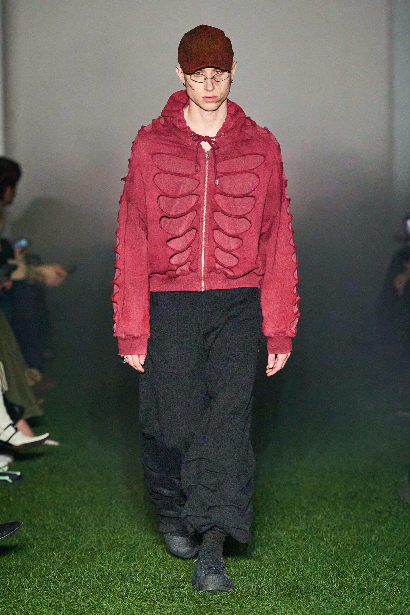 red relaxed hoodie with black pants