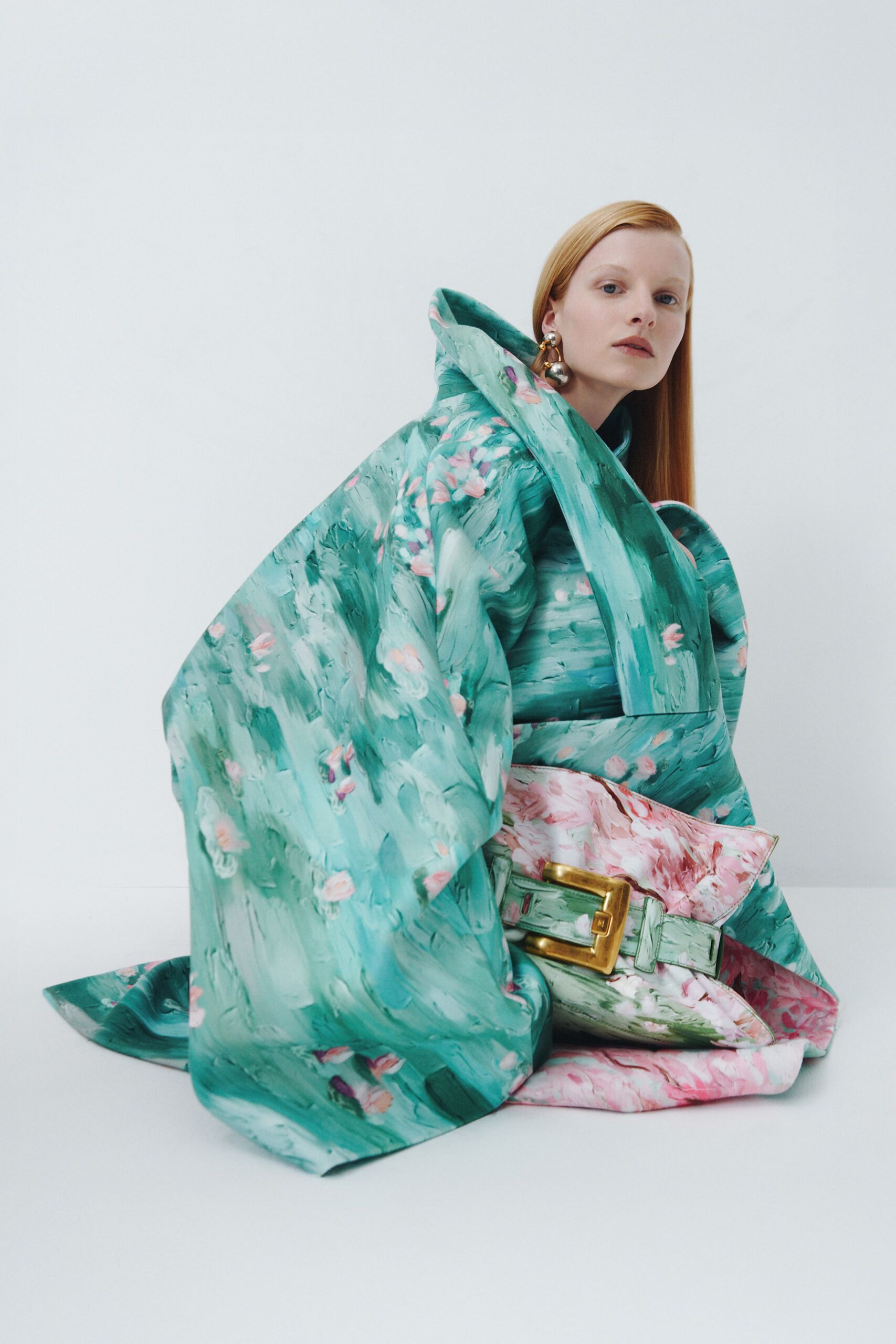 green silk long-sleeve collared oversized printed layered coat