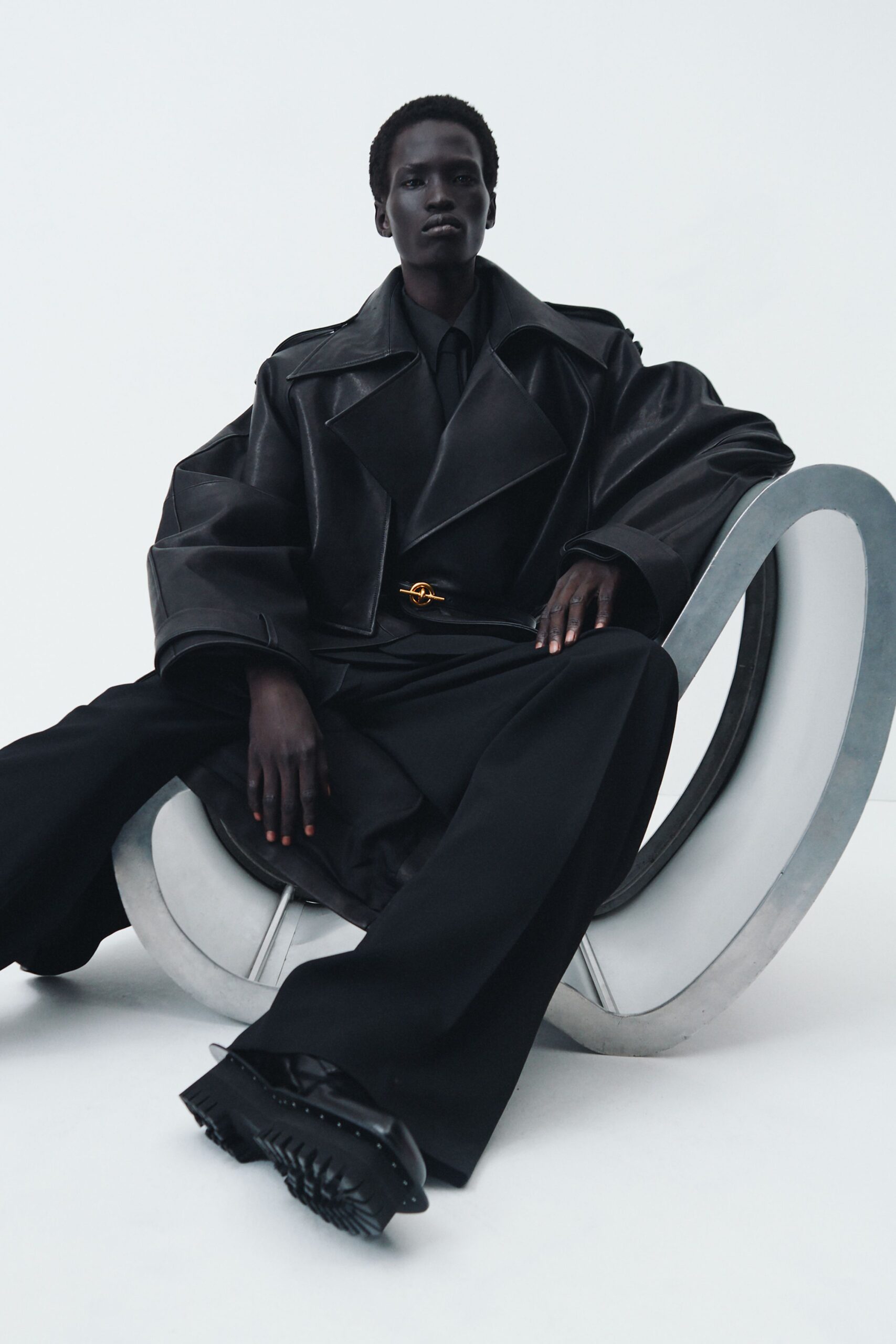 black leather long-sleeve collared oversized structured draped coat