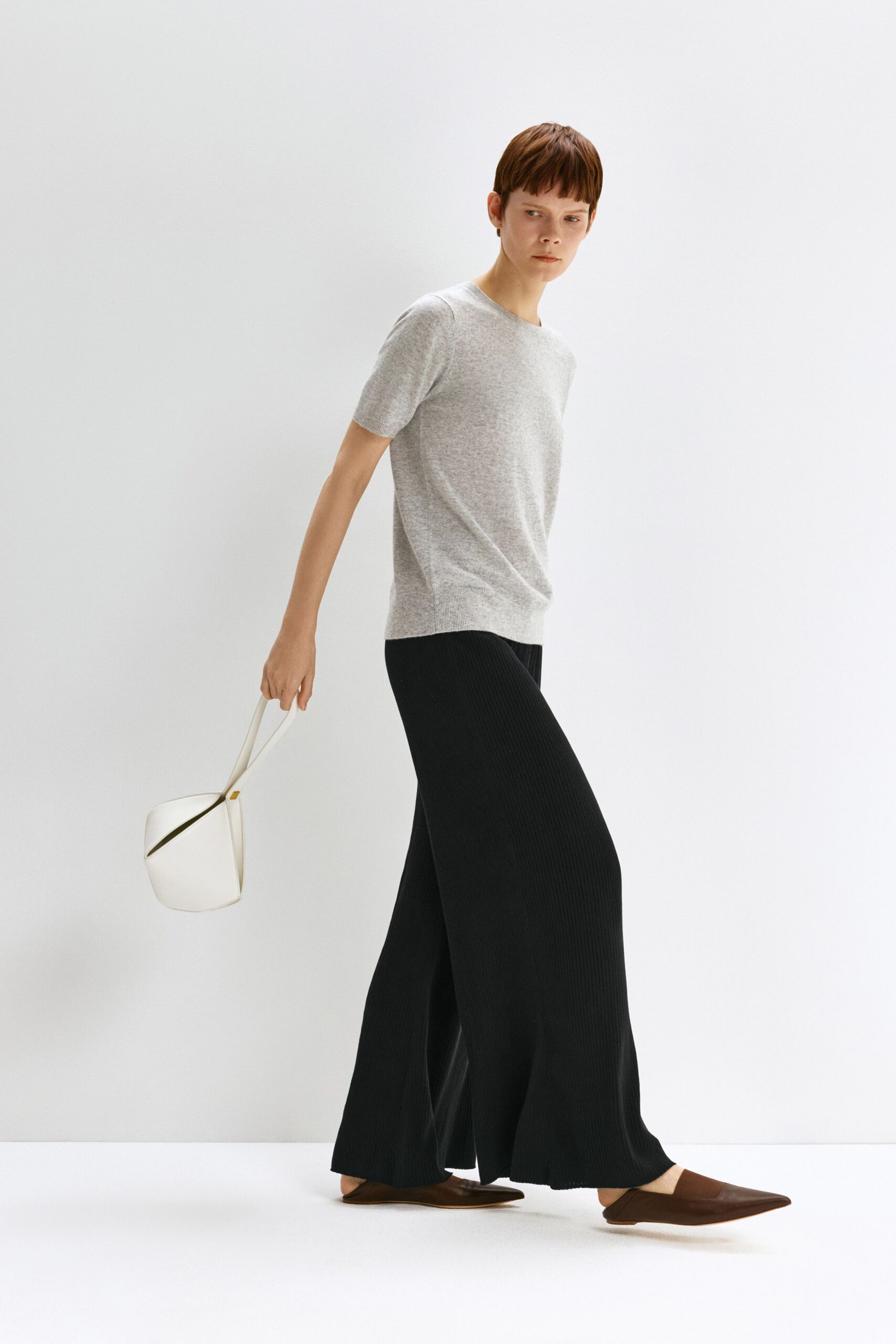 gray relaxed top with black wide-leg pants