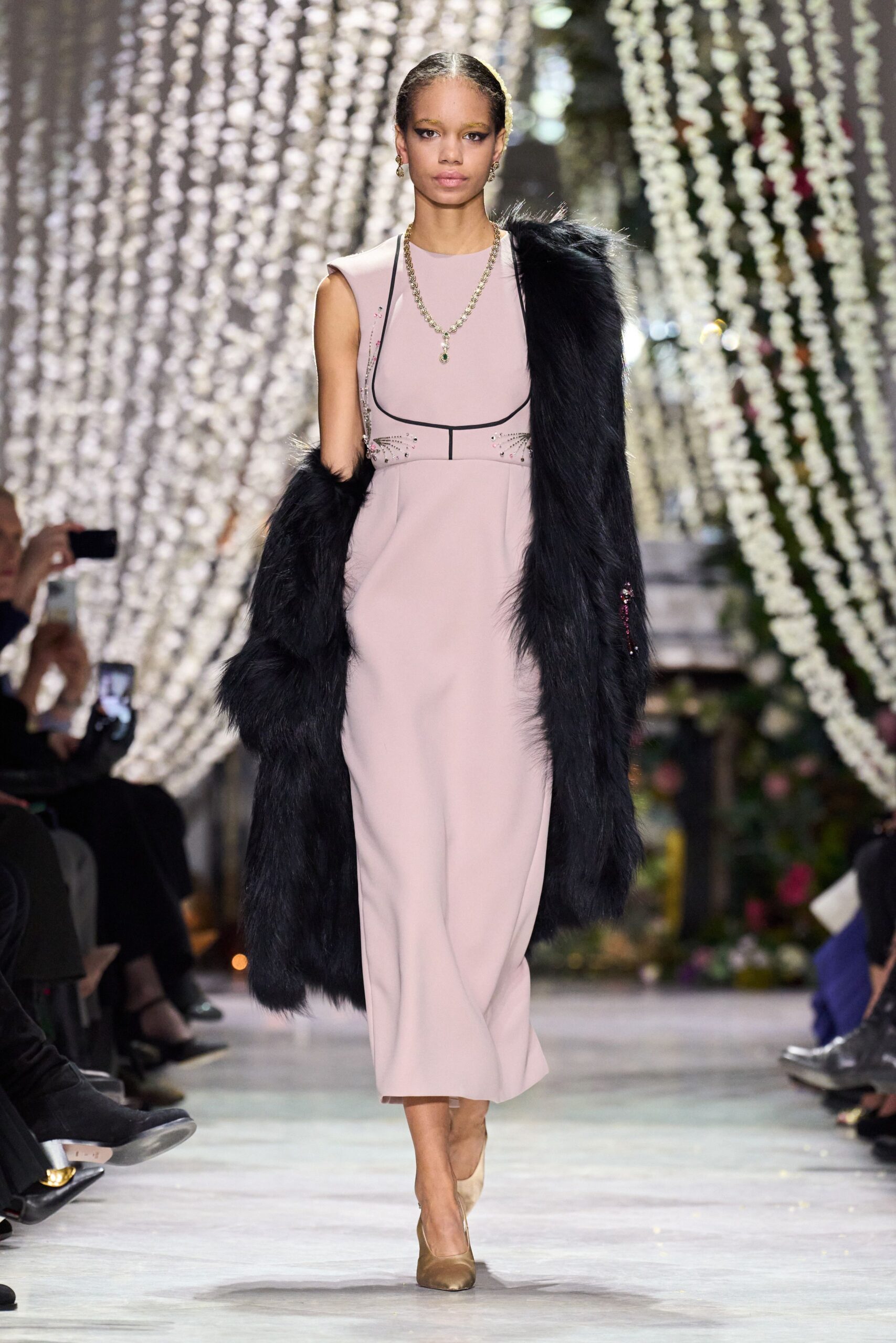 pink silk fitted dress with black coat