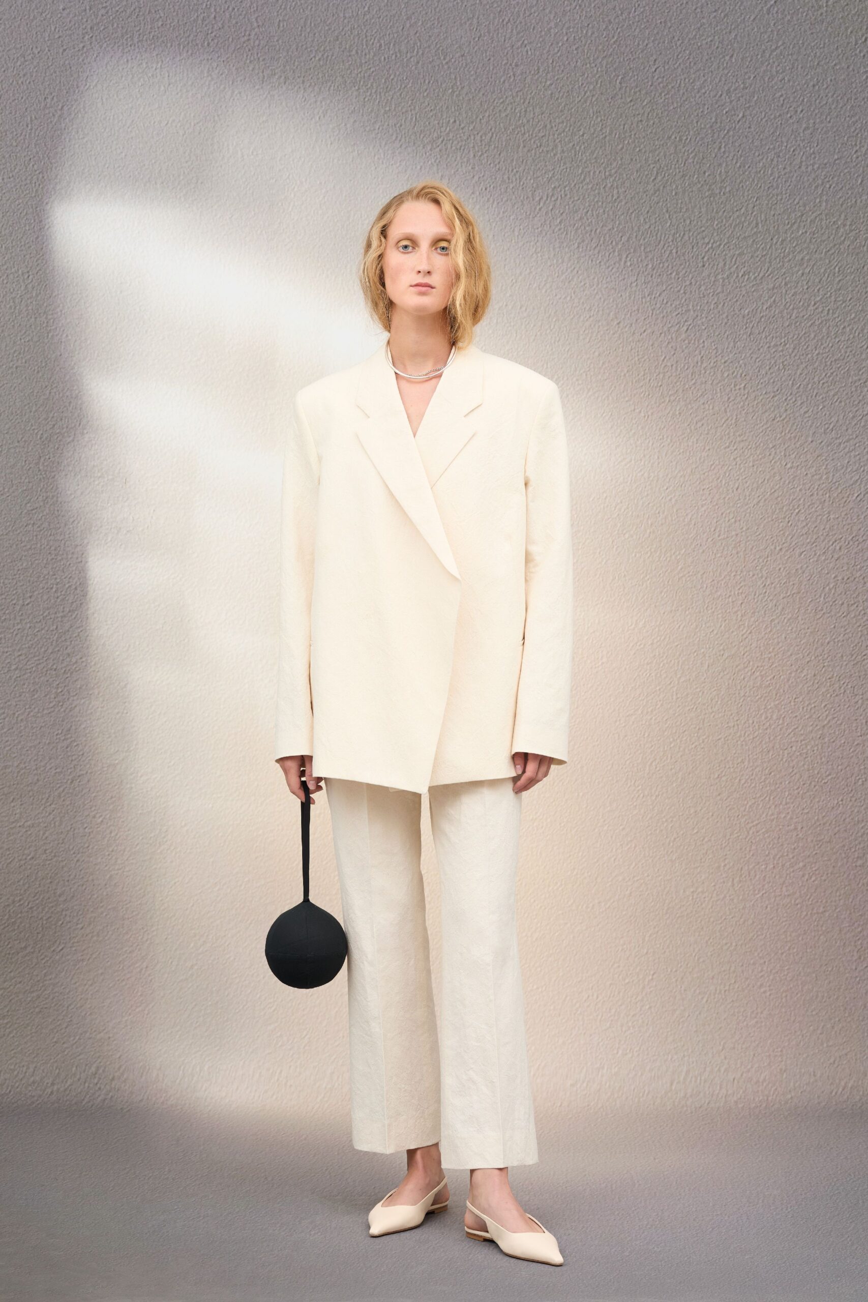 white oversized blazer with relaxed pants