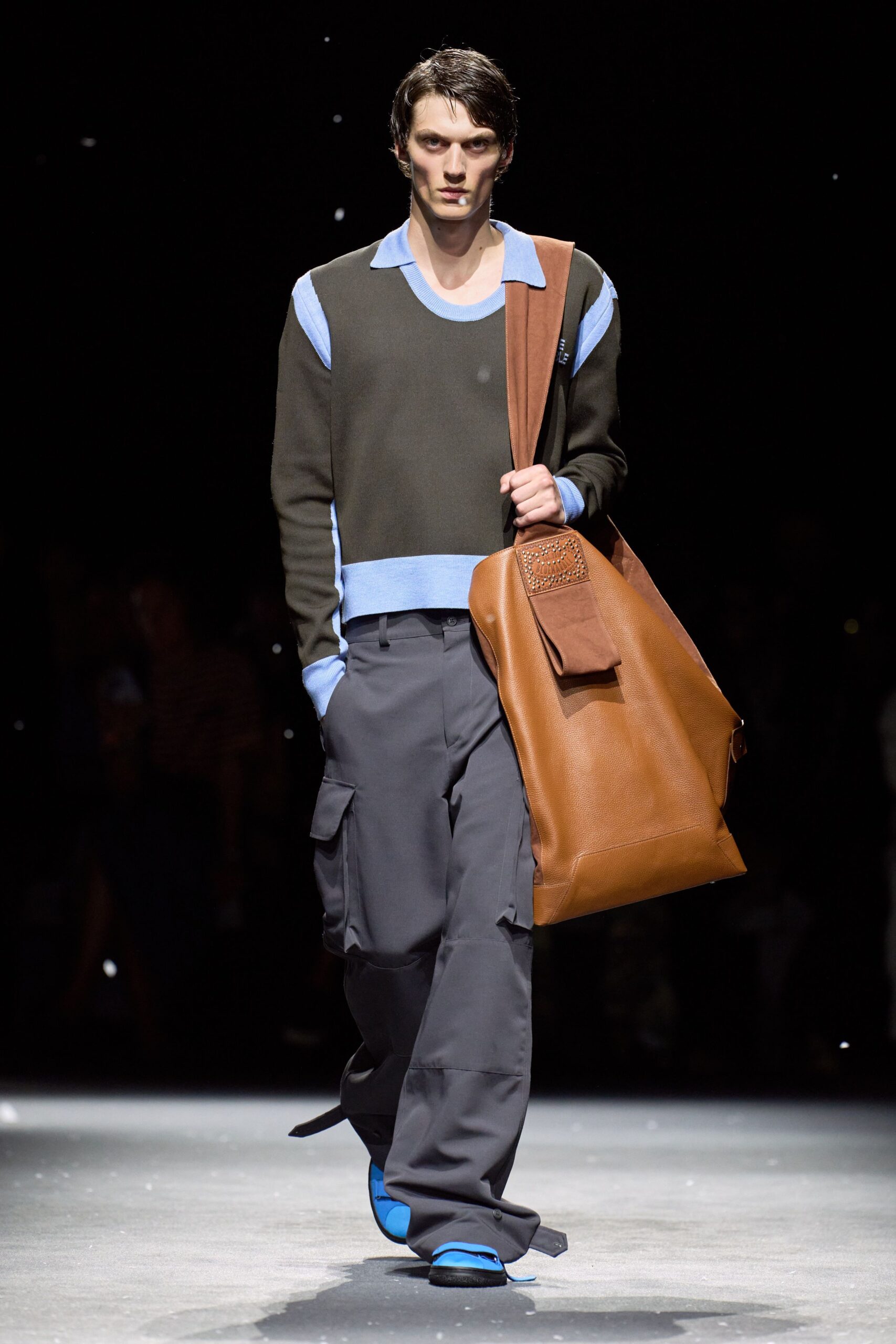 black and blue fitted sweater with cargo pants