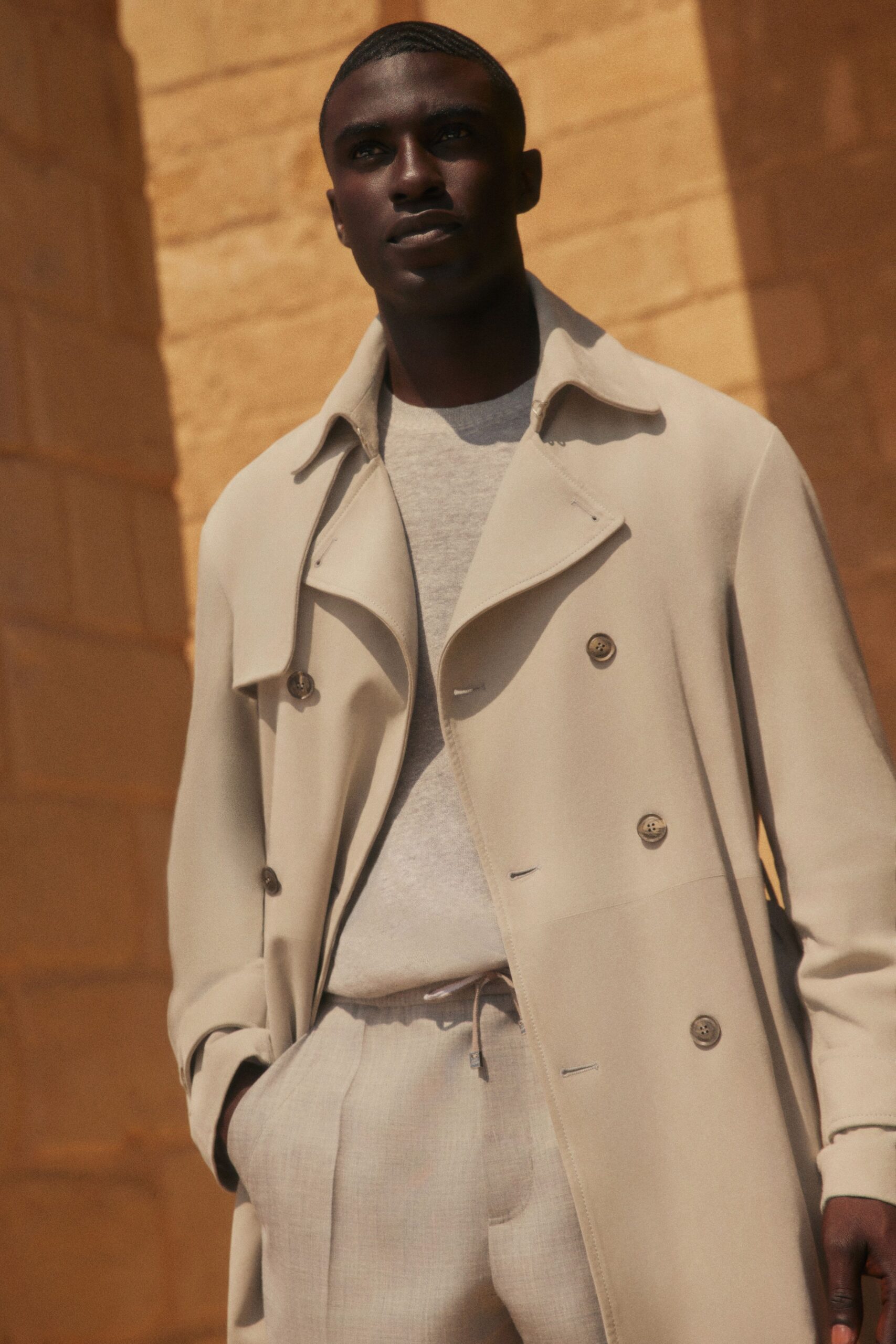 beige wool long-sleeve collared structured buttoned pockets coat