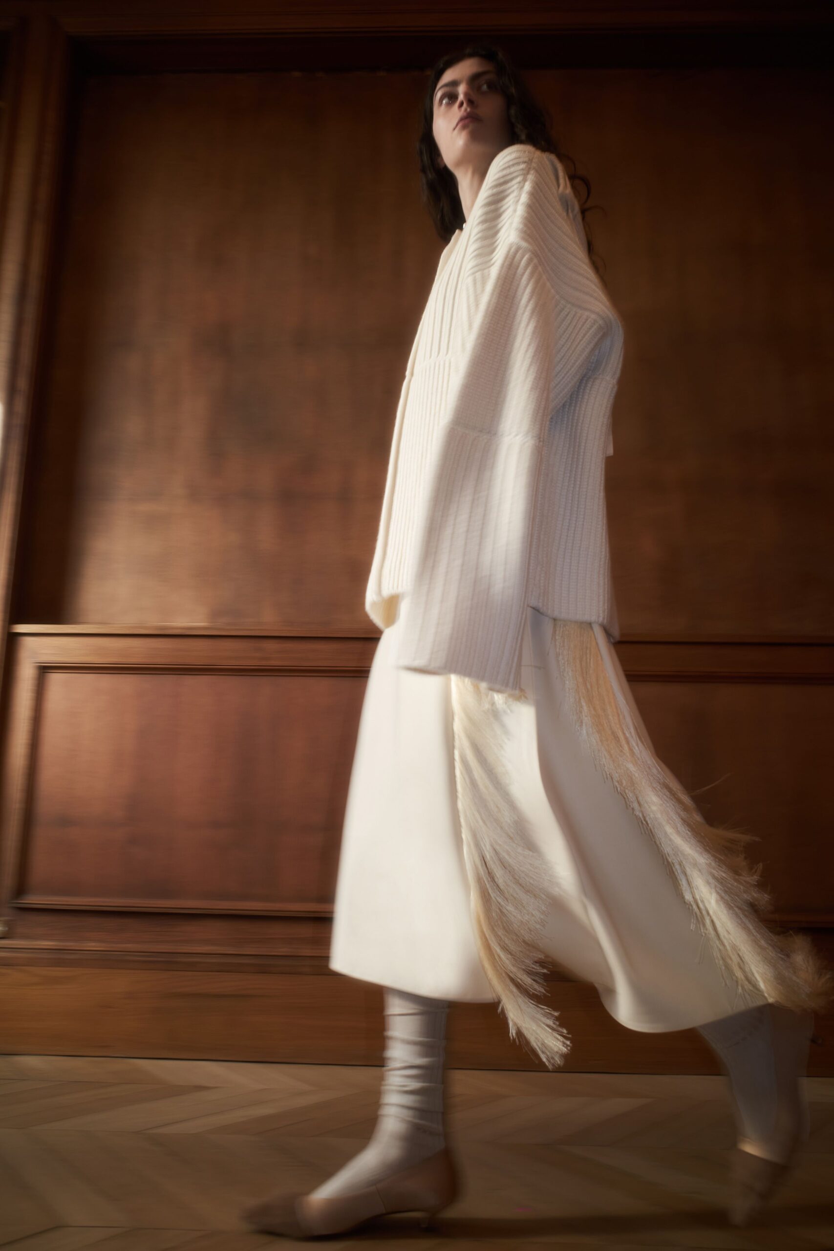 white relaxed top with fringed detail