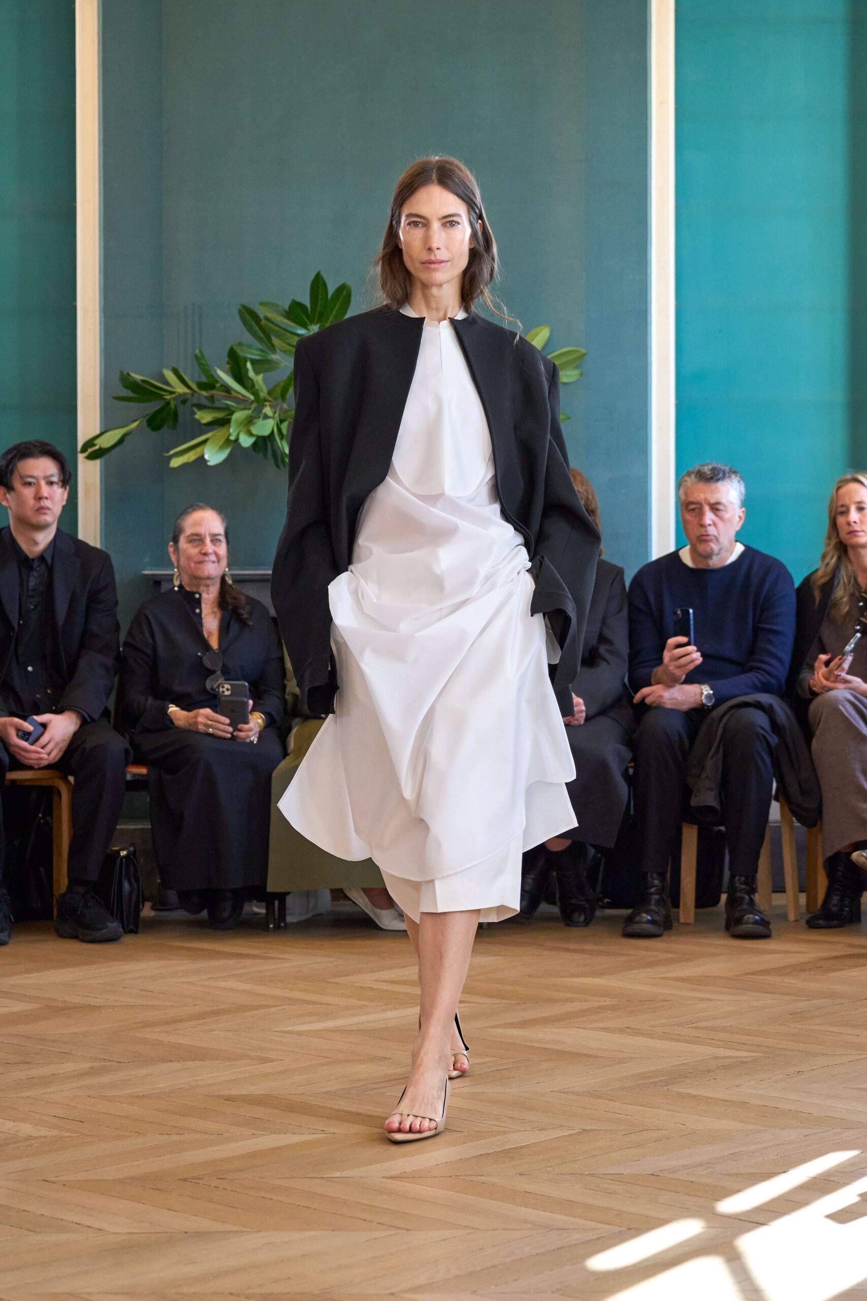 white silk midi dress with black cape