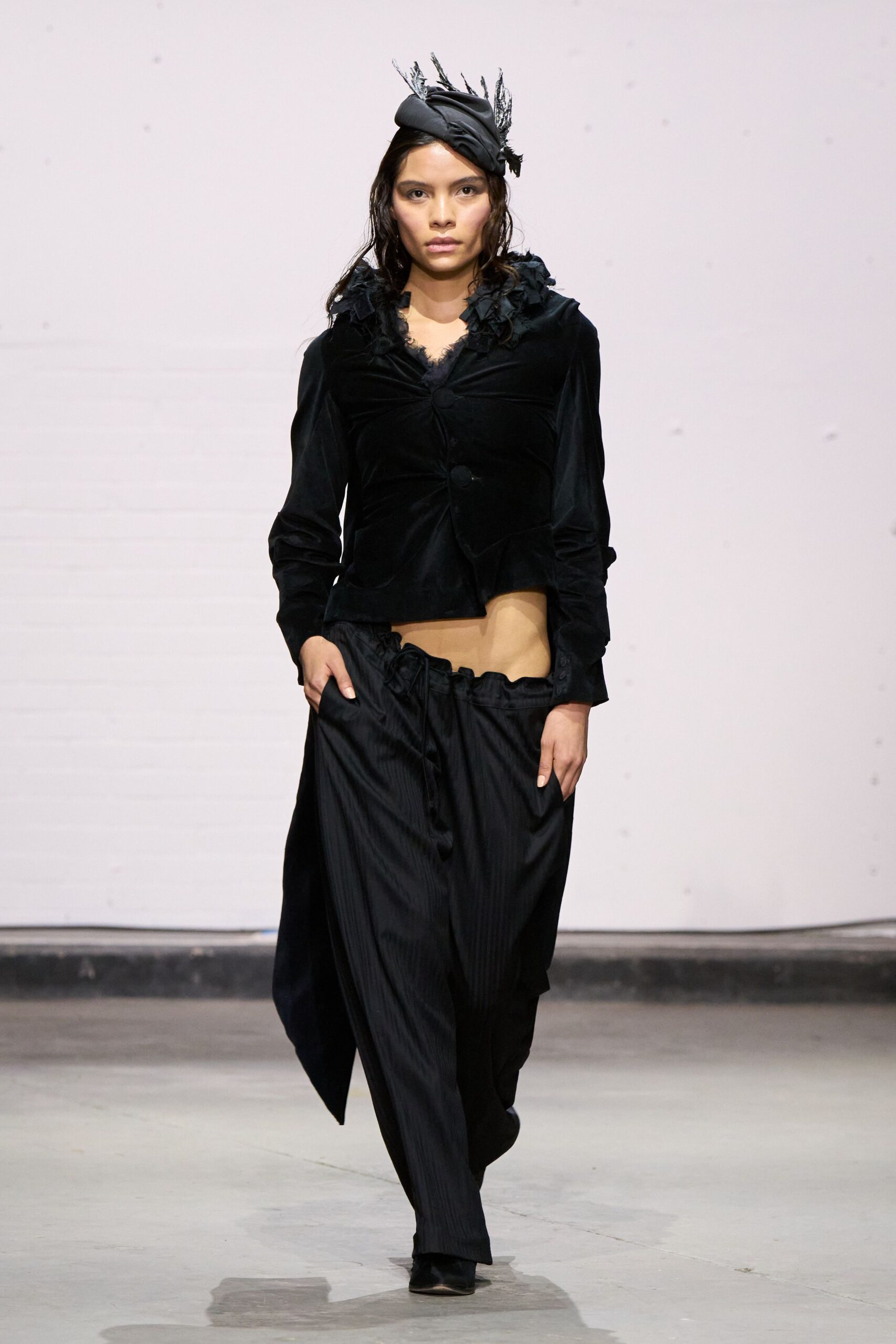 black velvet jacket with pleated pants