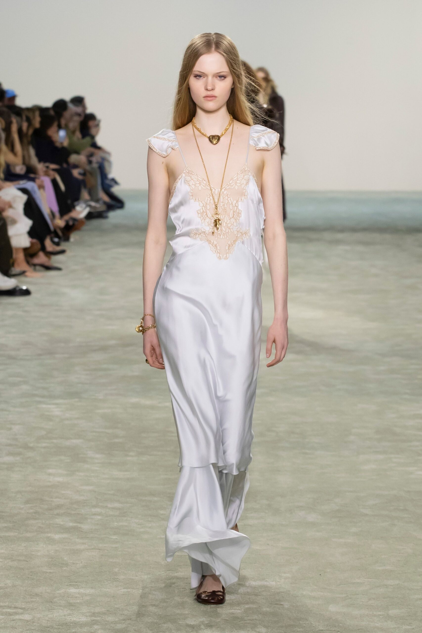 white silk embroidered gown