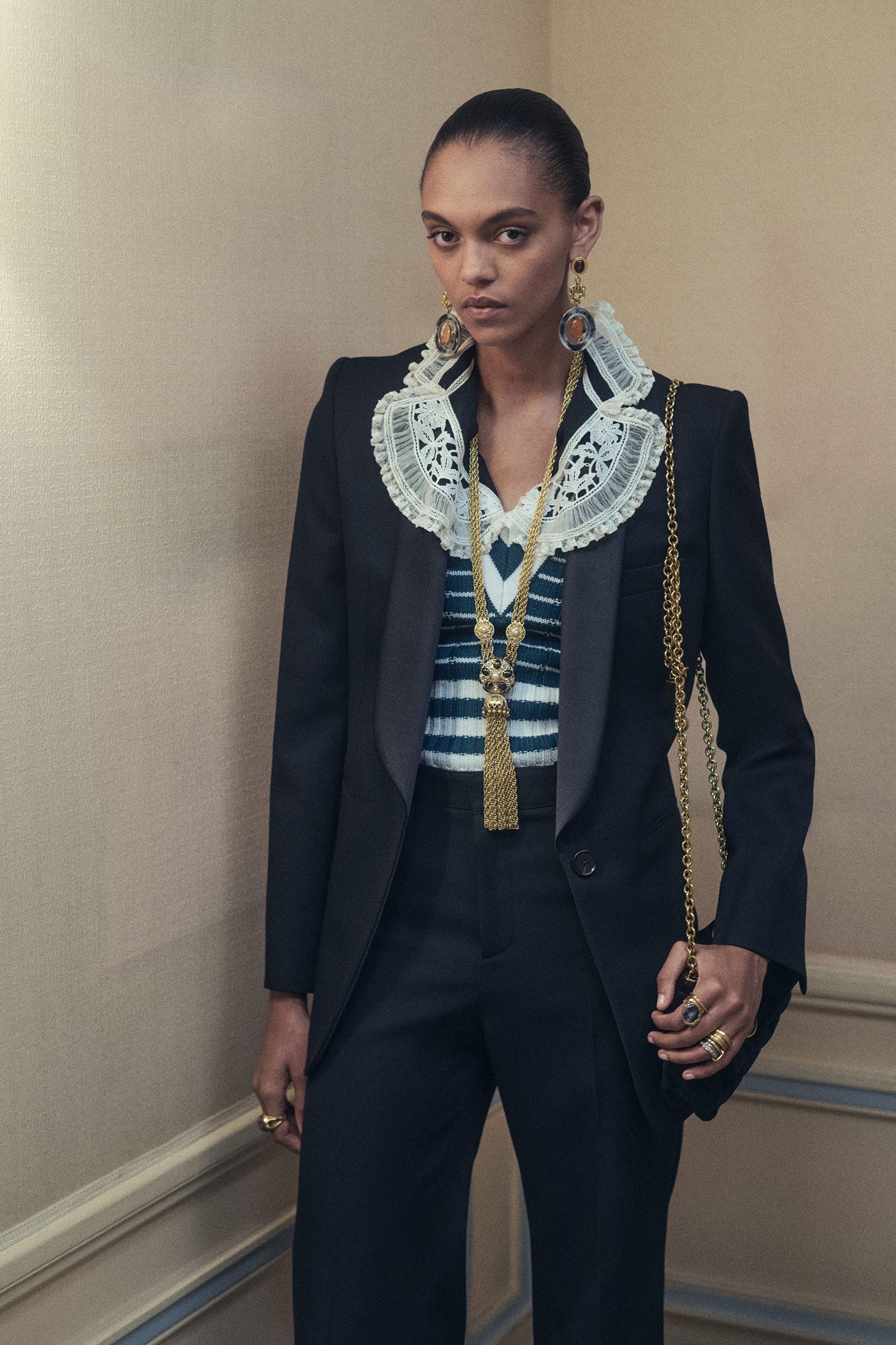 black tailored blazer with blue top