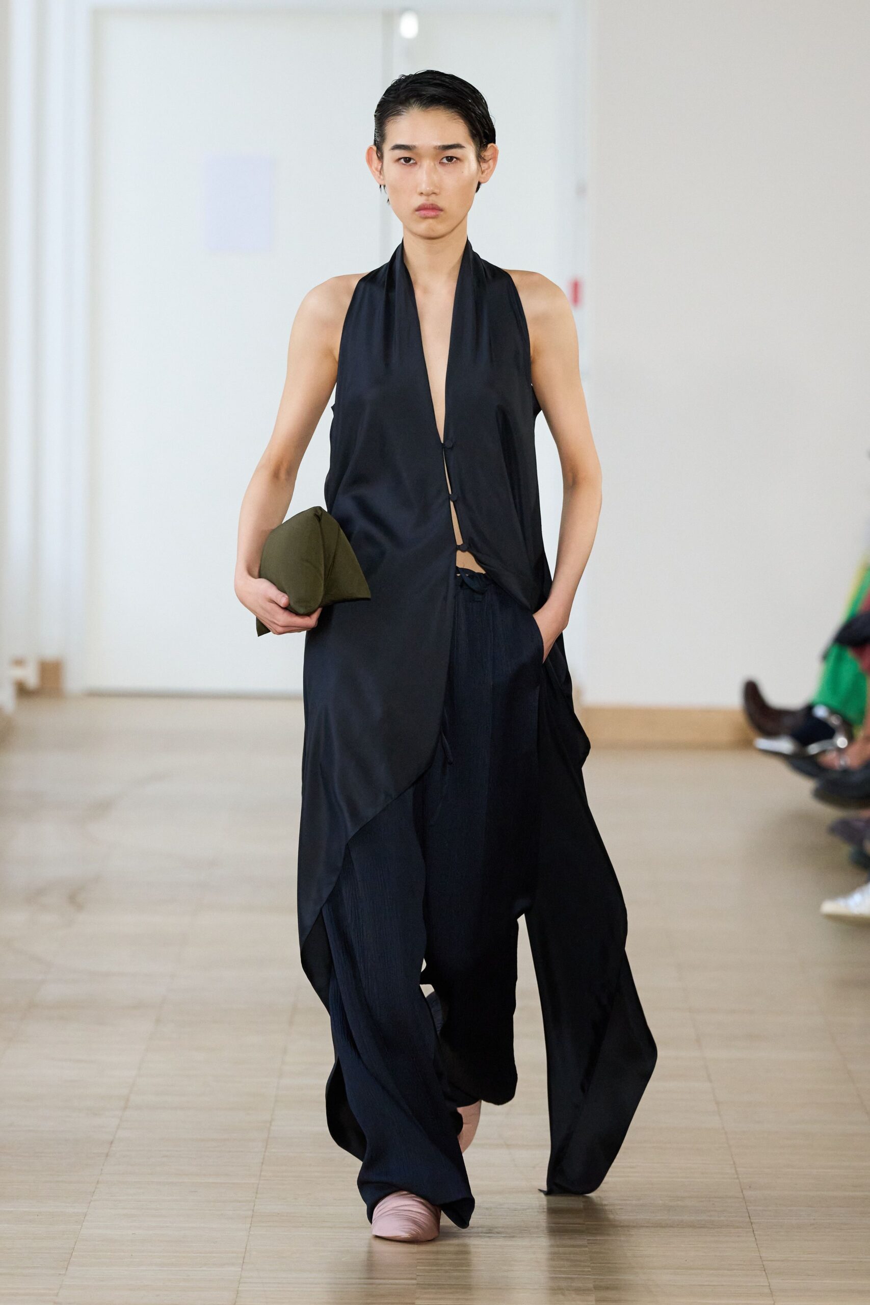 black silk sleeveless top with wide-leg pants