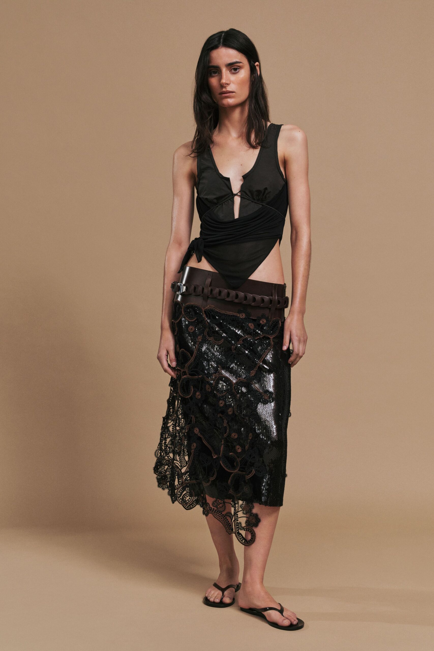 black fitted top and midi skirt