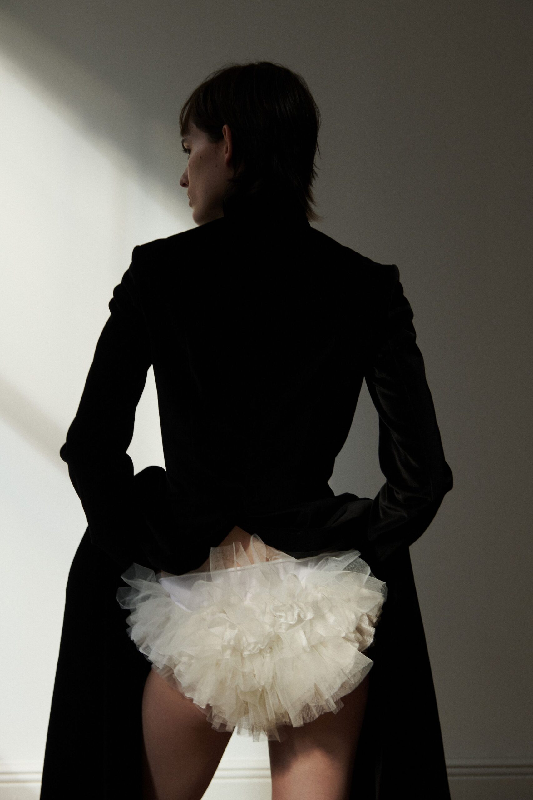 black velvet long-sleeve collared fitted draped coat