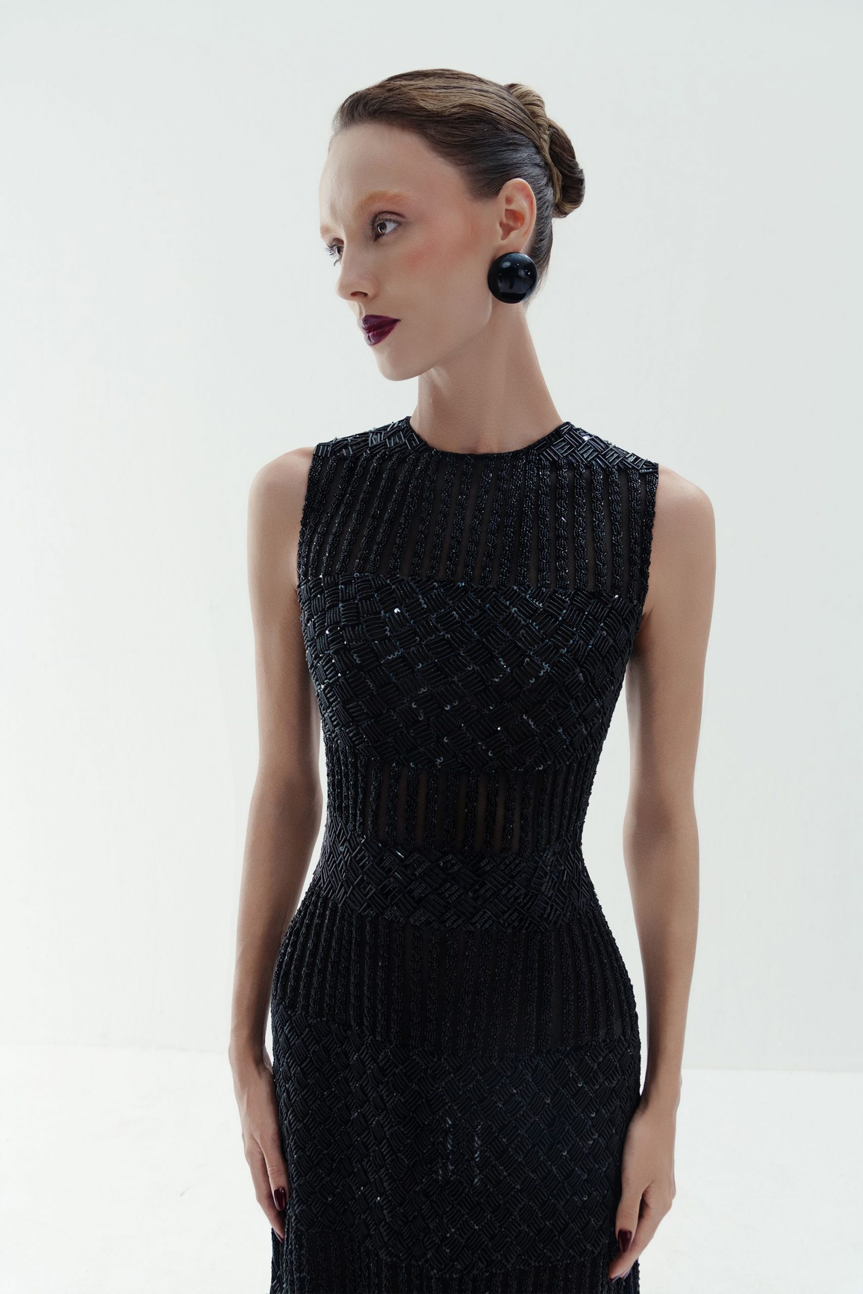 black beaded sleeveless gown