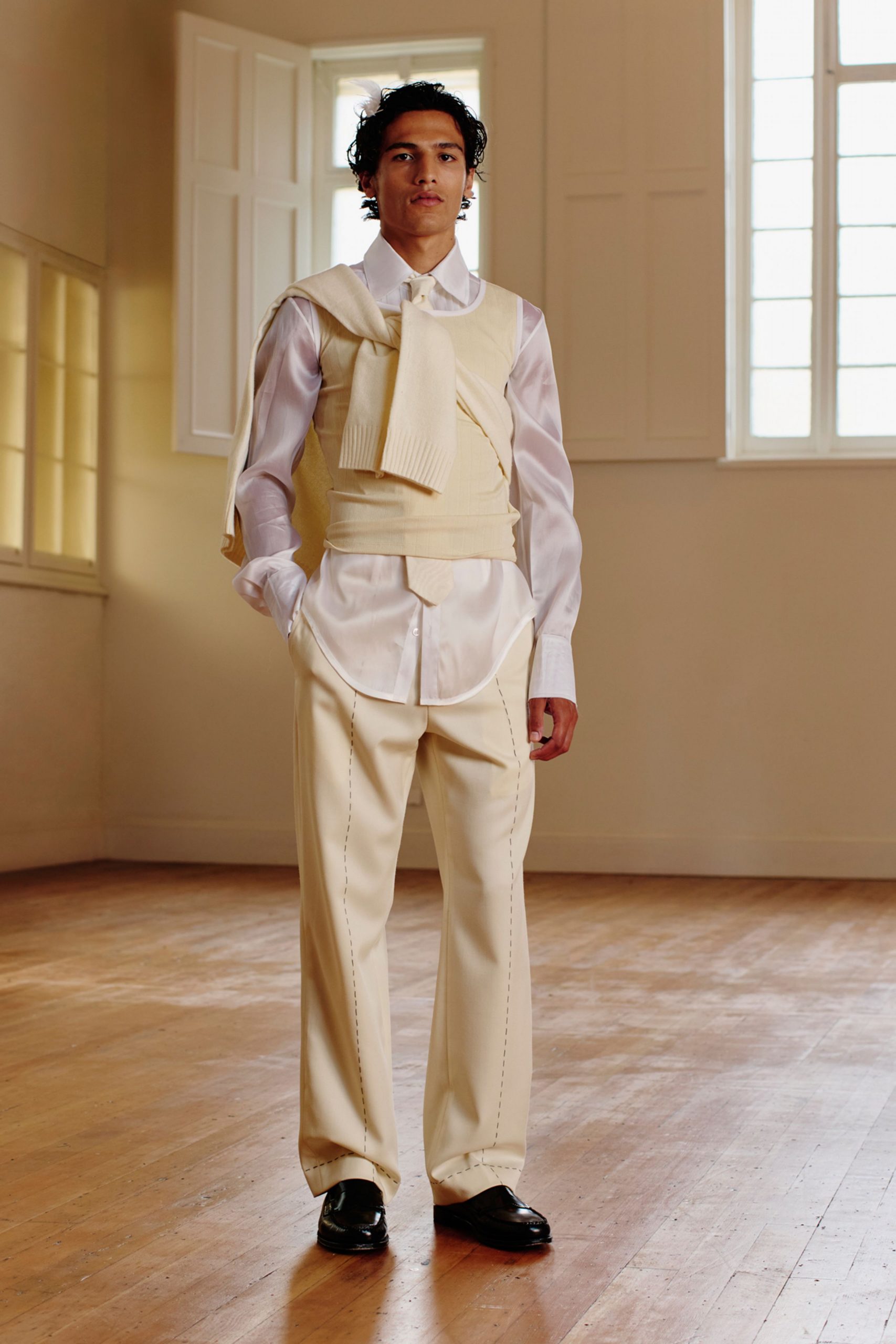 white shirt beige vest tailored pants