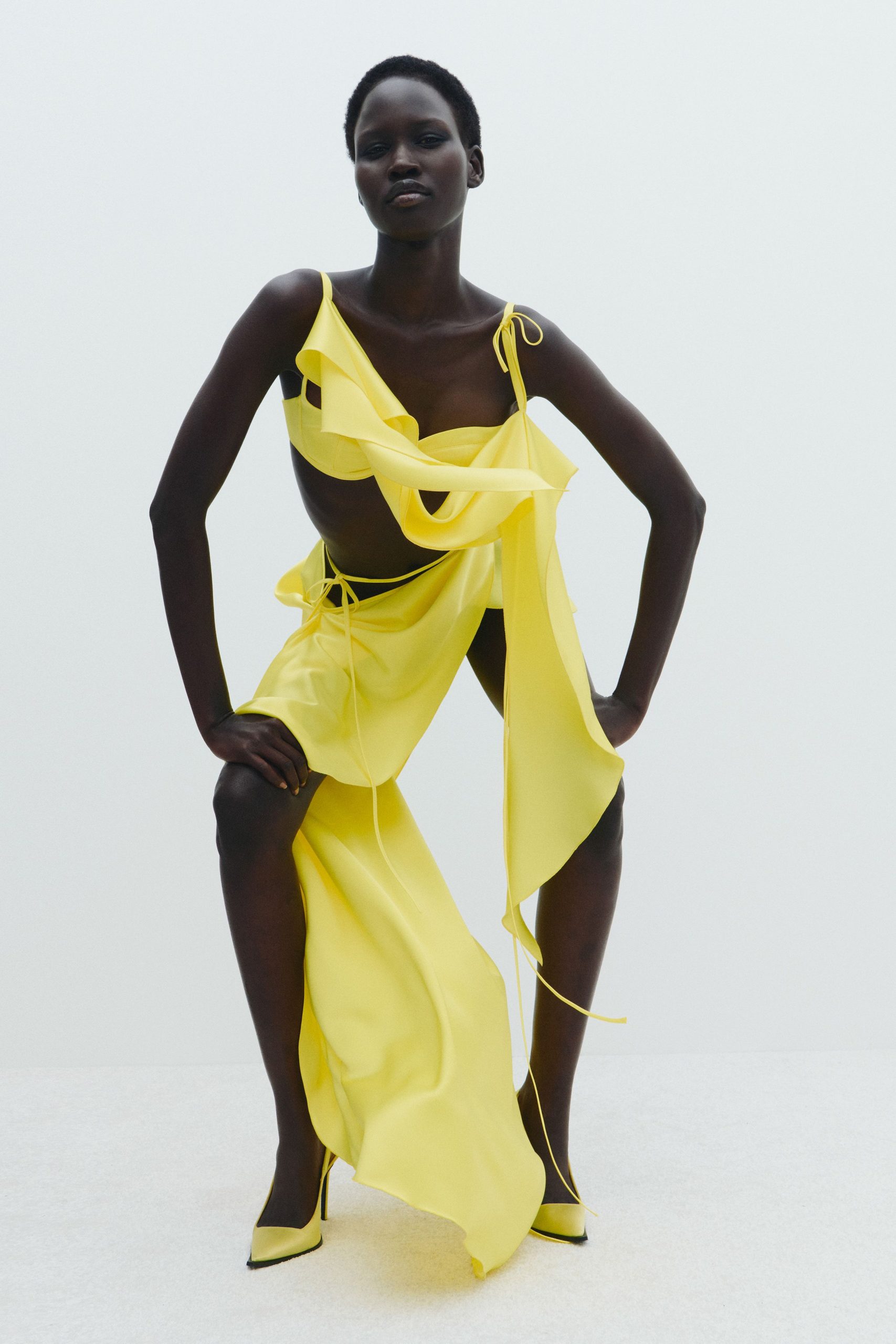 yellow silk sleeveless asymmetric fitted draped flowing dress