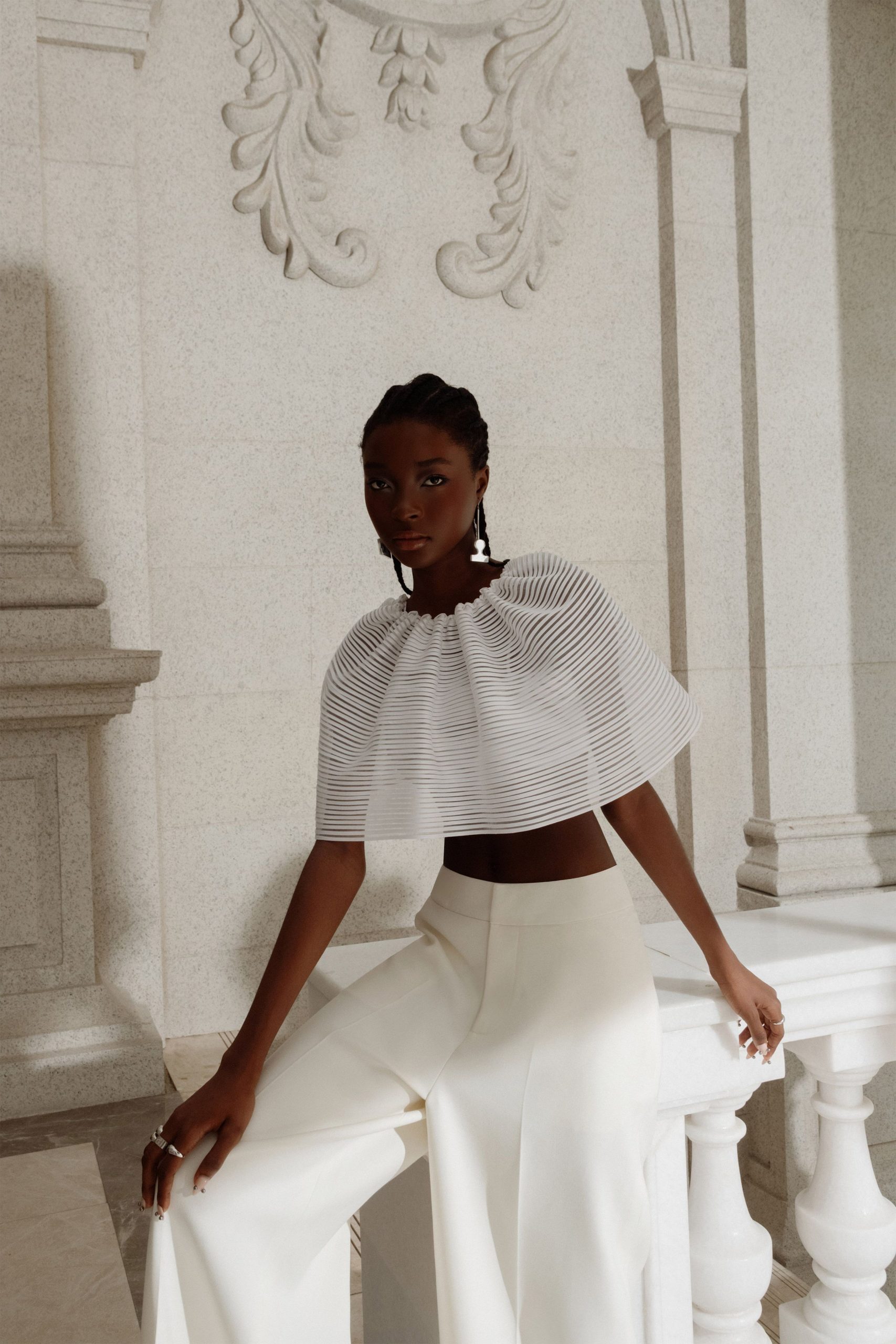 white pleated top and wide-leg pants