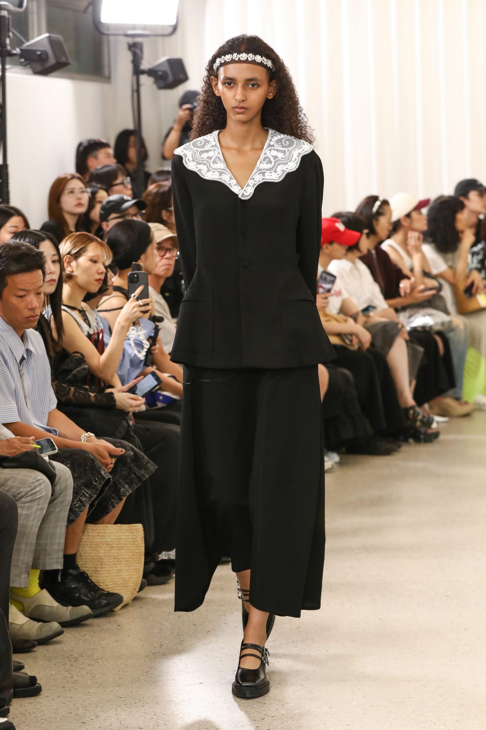 black structured blazer with wide-leg pants