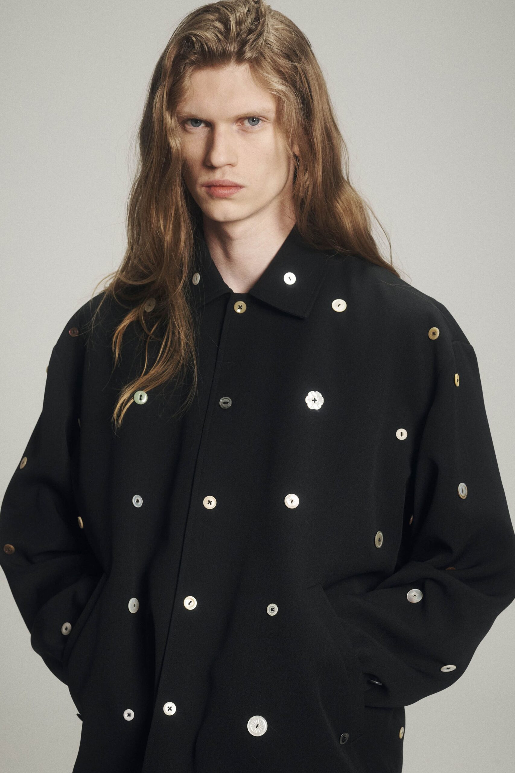 black oversized buttoned coat