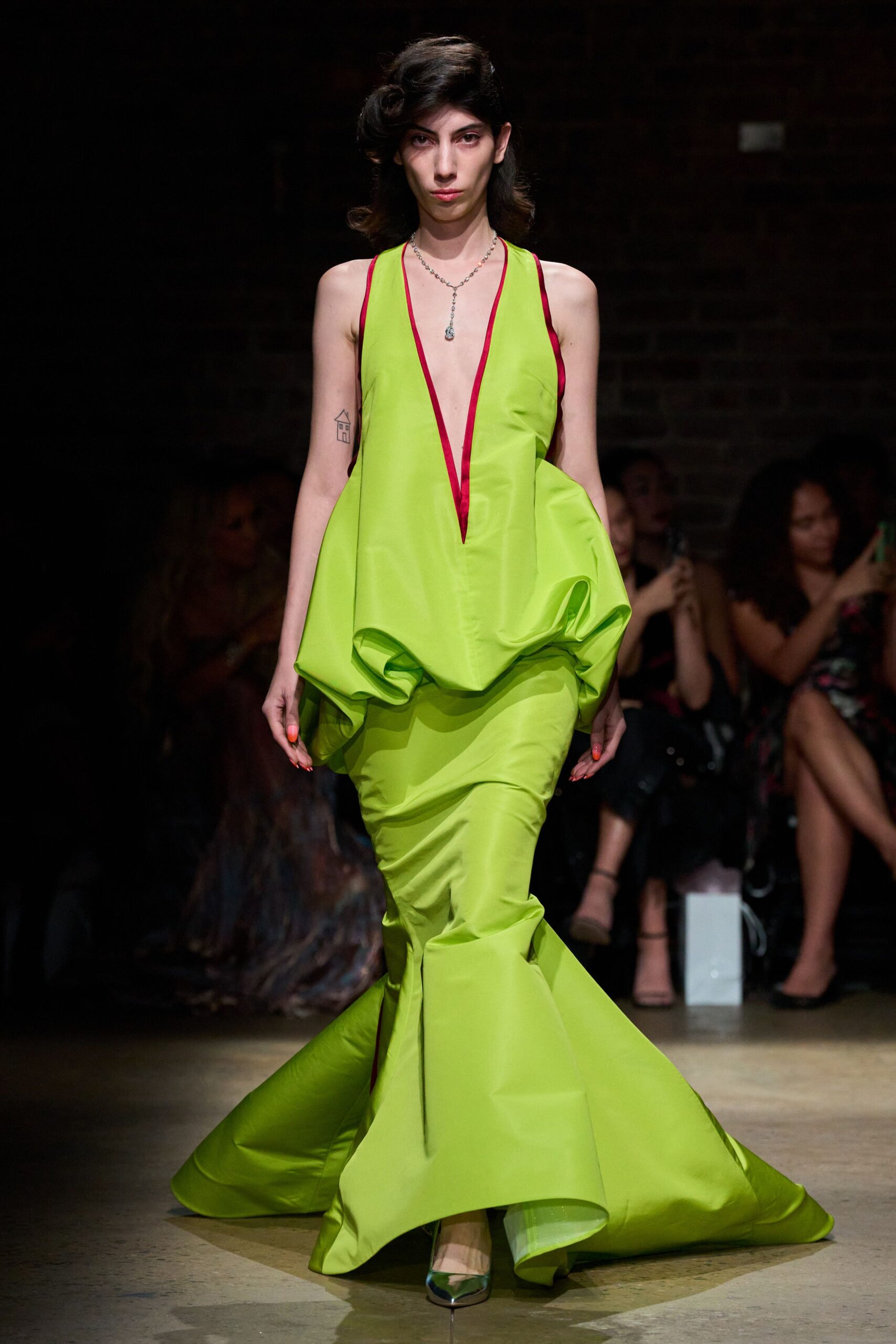 green silk sleeveless v-neck fitted draped flared gown
