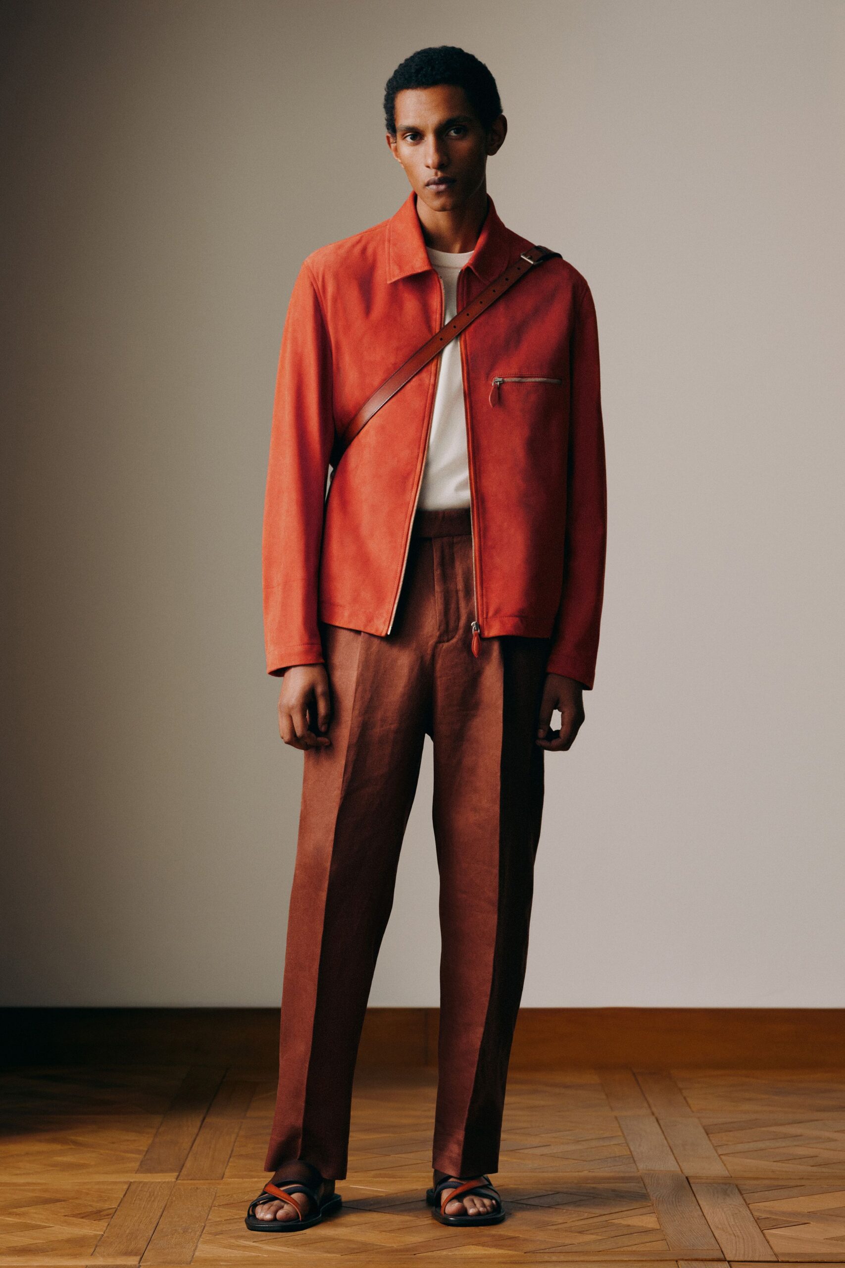 red suede long-sleeve collared fitted zippered jacket