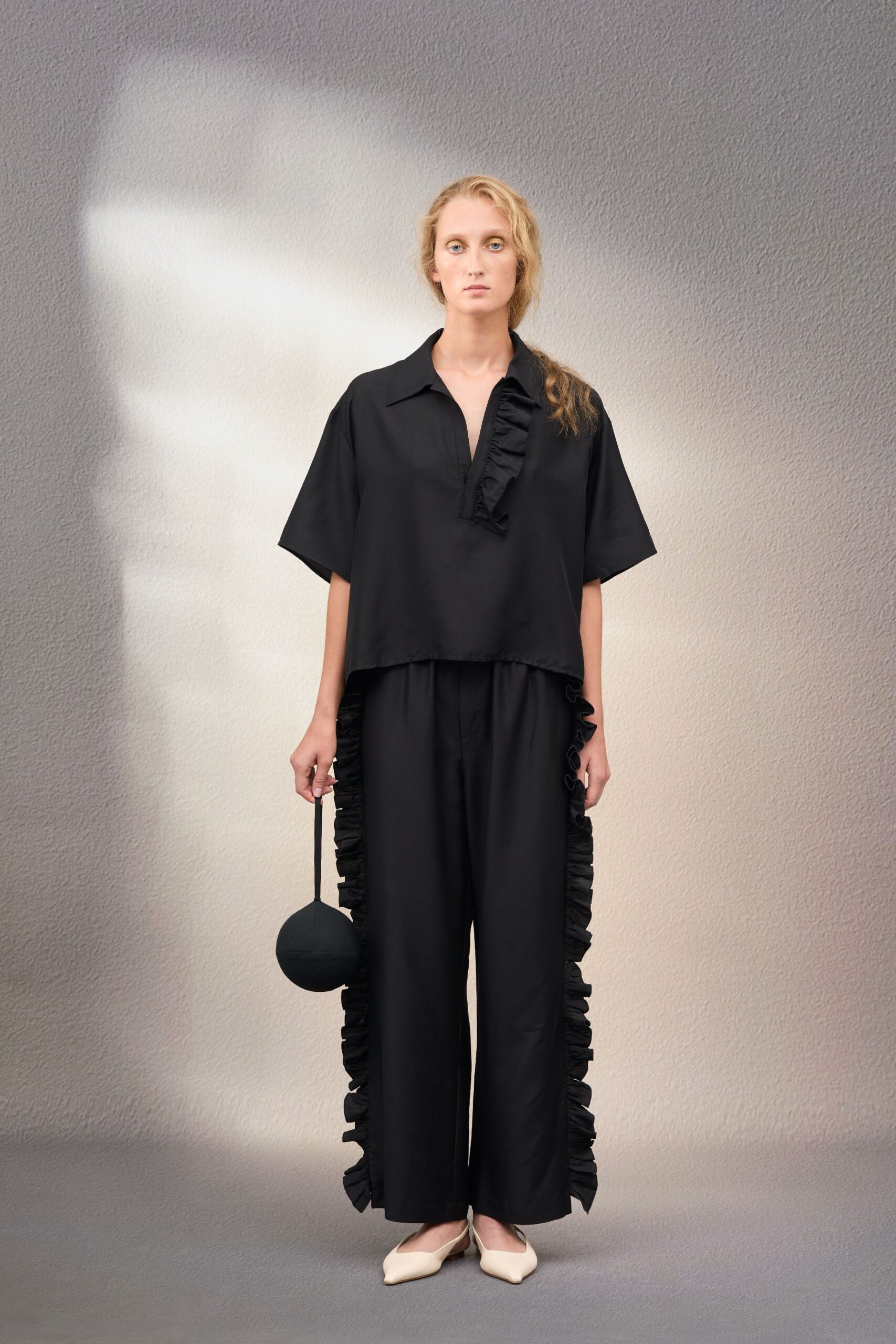 black silk relaxed ruffled pants
