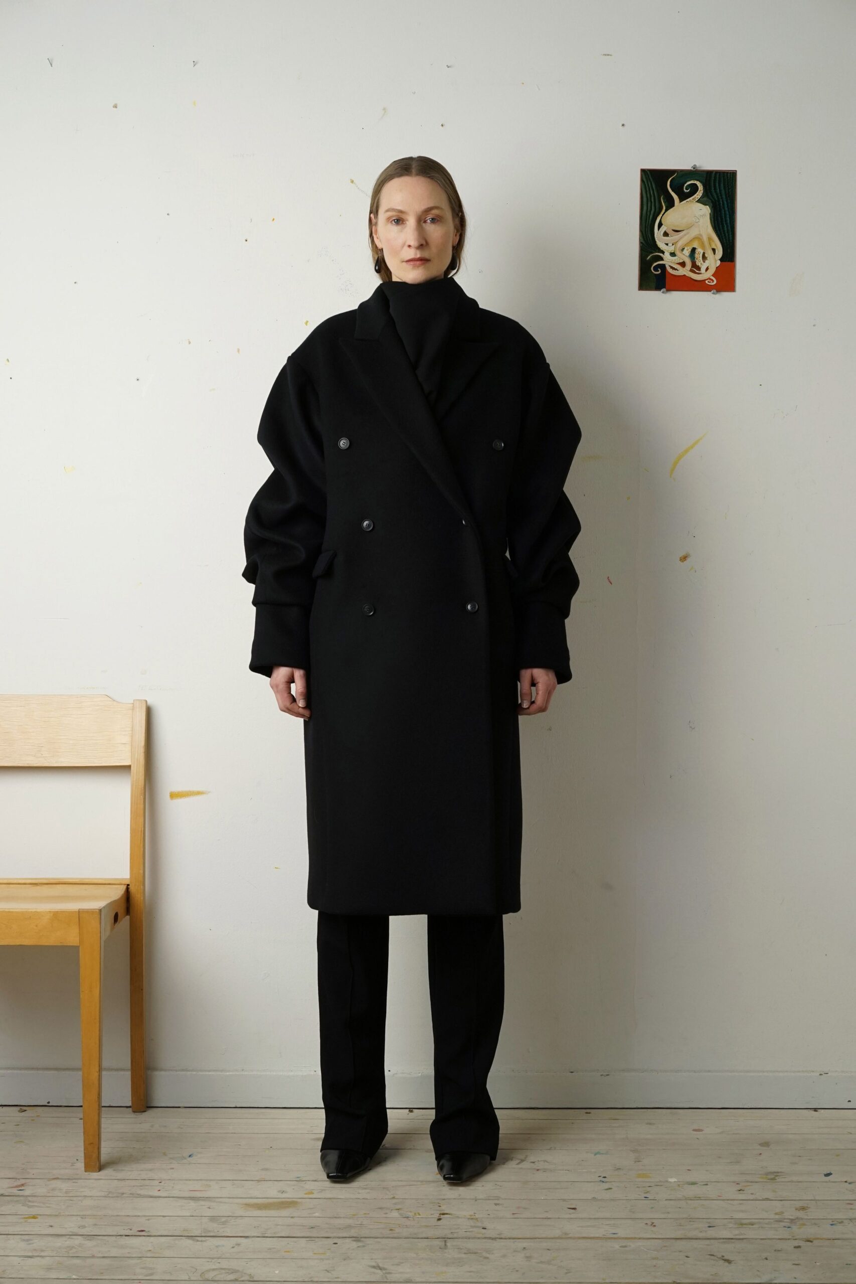 black oversized wool coat with tailored pants