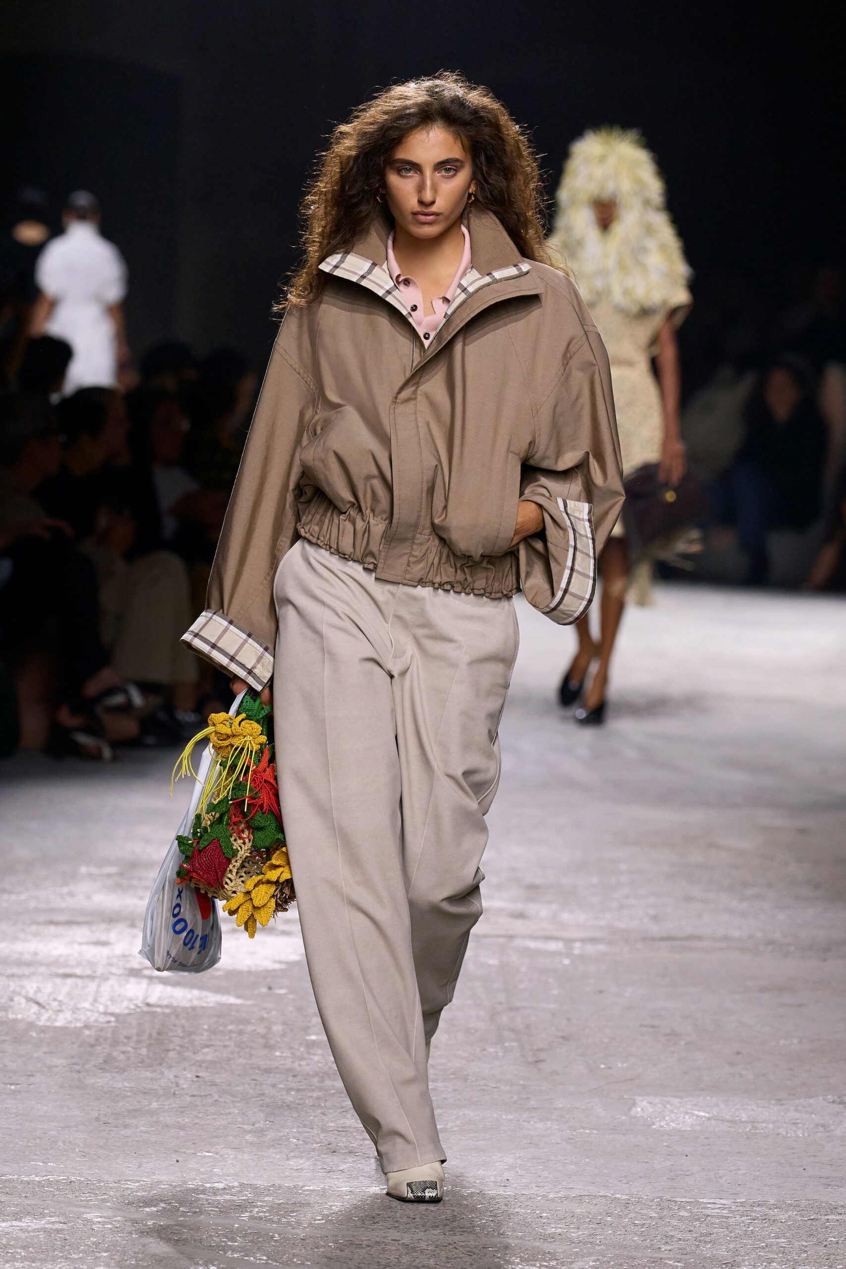 brown relaxed jacket with beige pants