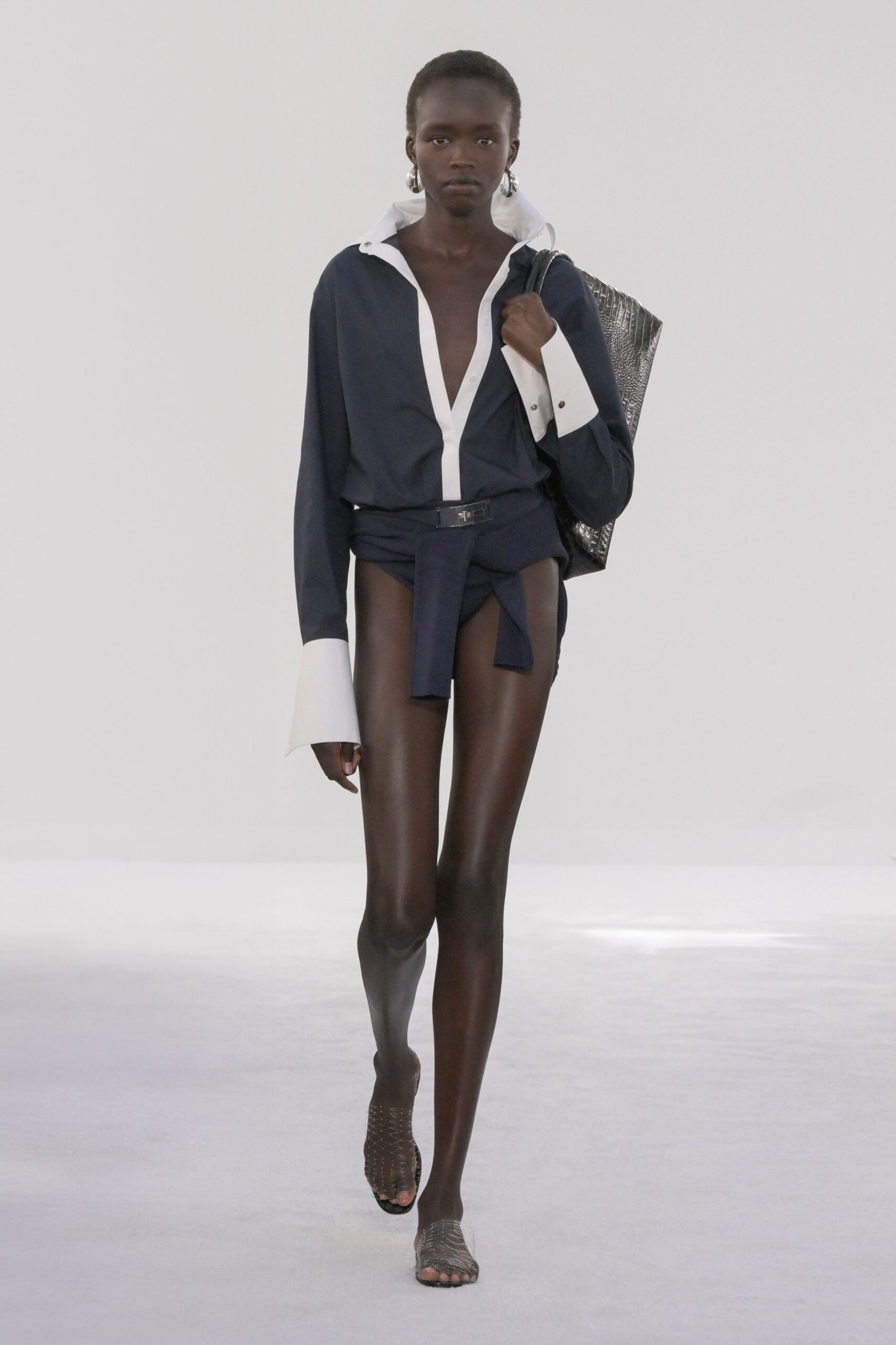 navy and white fitted shirt with black shorts